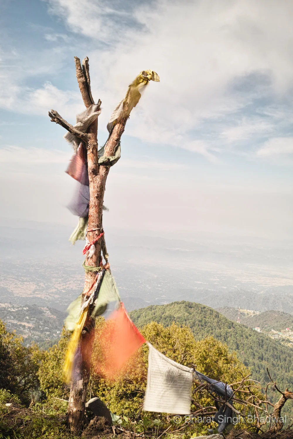 Tibetan prayer flags flutter gaily along our trek route.