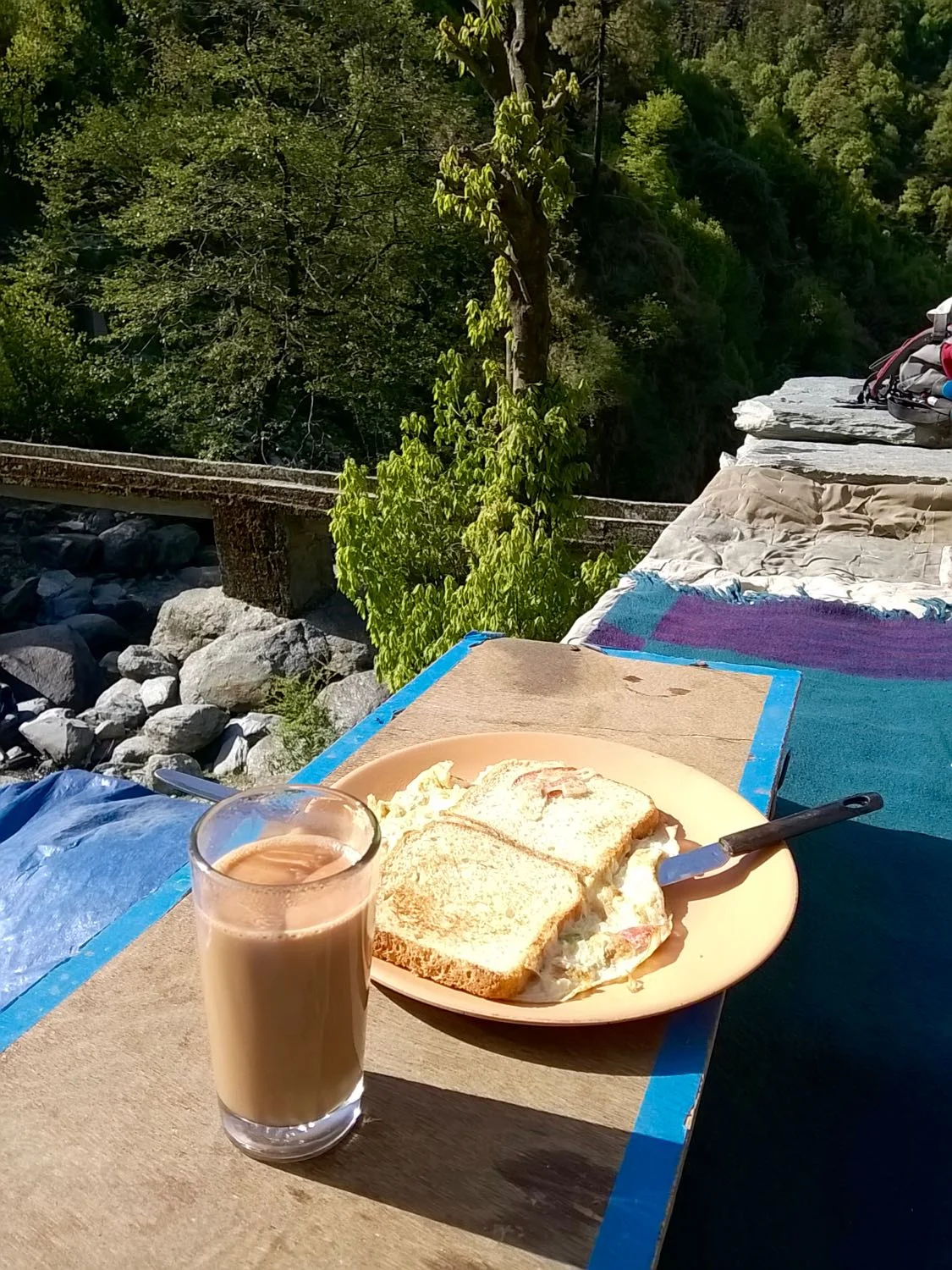 Breakfast at Adventure cafe. The bridge in the background crosses Bhated Stream