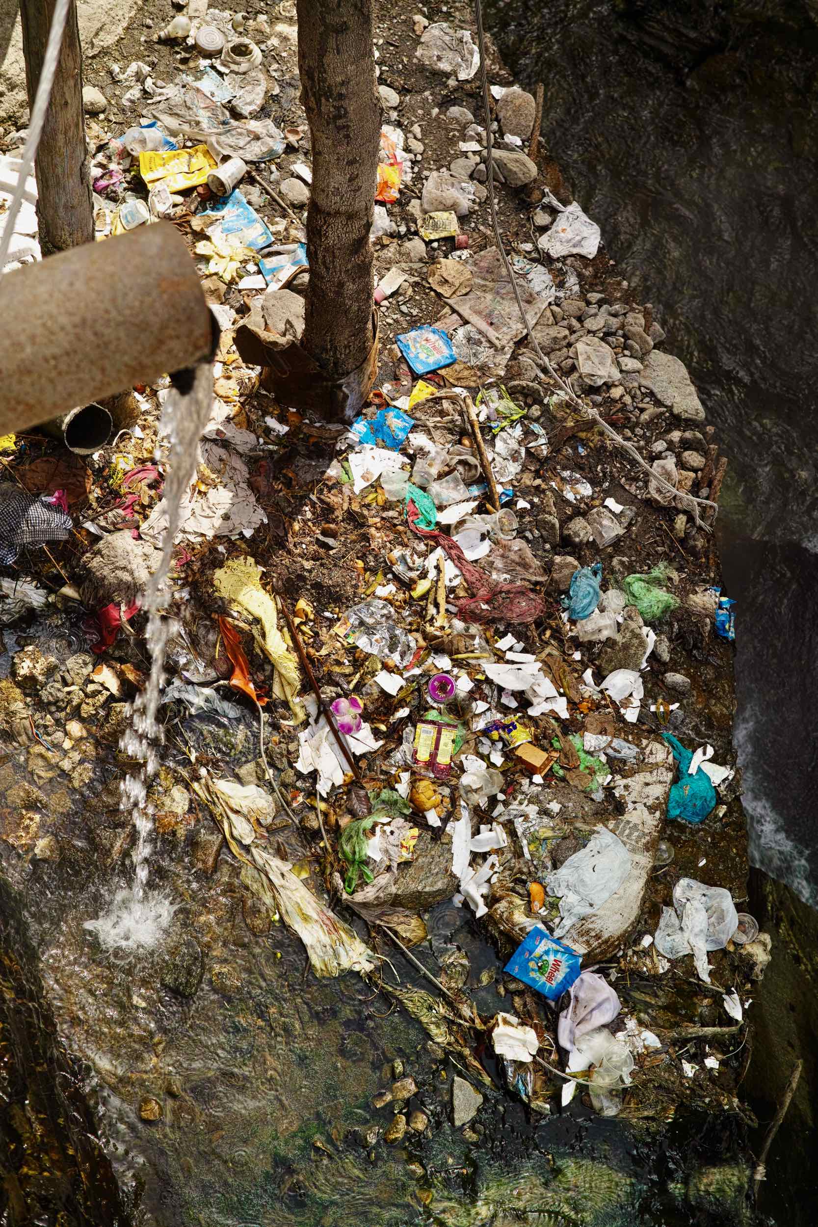 Maa Yamuna here's our offering to you, plastic, non-biodegradable junk and human faeces. This is the runoff from the hot water springs Surya Kund & Gauri Kund joining the river.