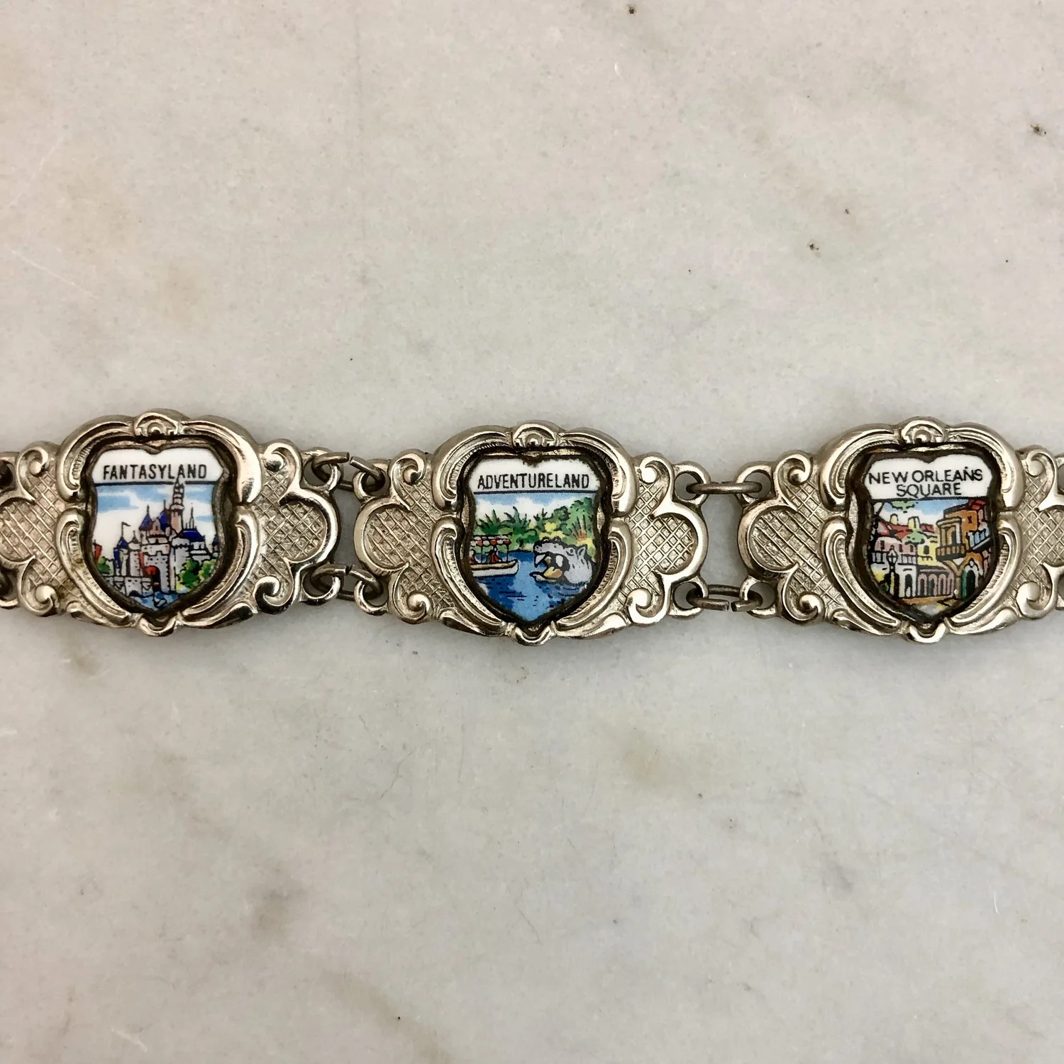 Rare Vintage Disneyland Bracelet 6 Enameled Lands — Worn-Over-Time