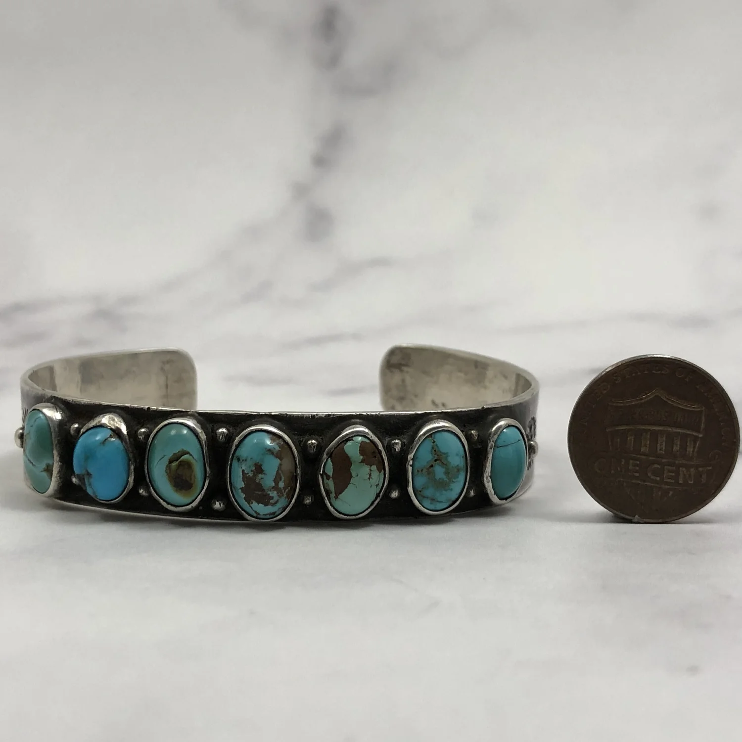 Fred Harvey Era Navajo 7 Oval Stone Turquoise Ingot Silver Row