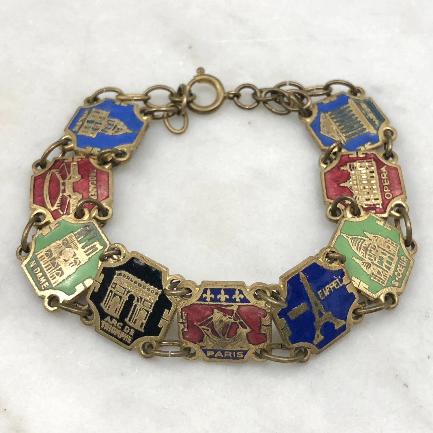 ヴィンテージ ブレスレット　パリの観光名所がシェルの上に細工 Vintage Enamel Paris Souvenir Bracelet — Worn-Over-Time