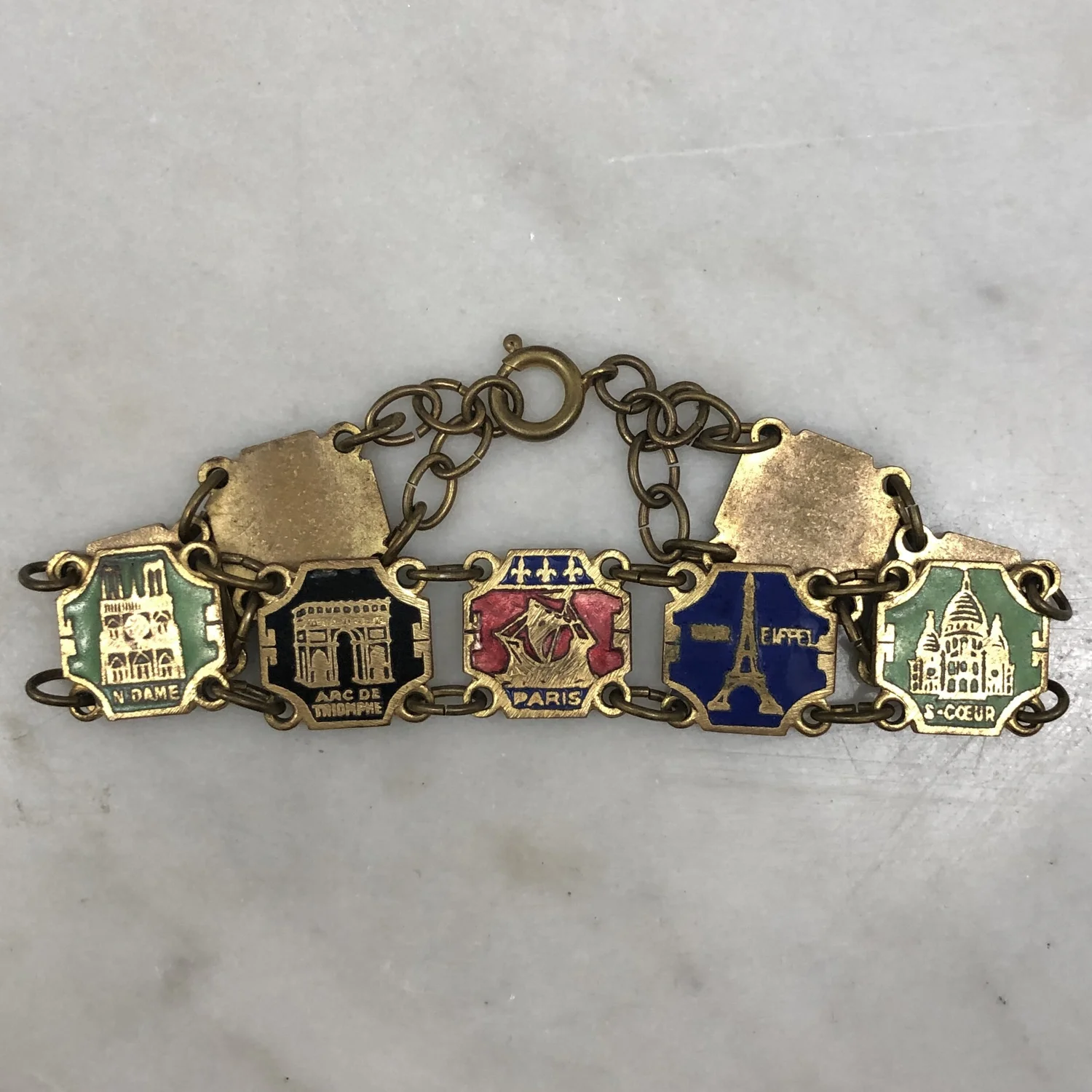 ヴィンテージ ブレスレット　パリの観光名所がシェルの上に細工 Vintage Enamel Paris Souvenir Bracelet — Worn-Over-Time