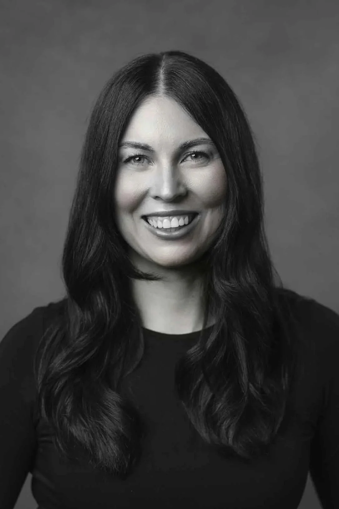 Professional black and white actor headshot of an actress photographed by a Winnipeg headshot photographer.