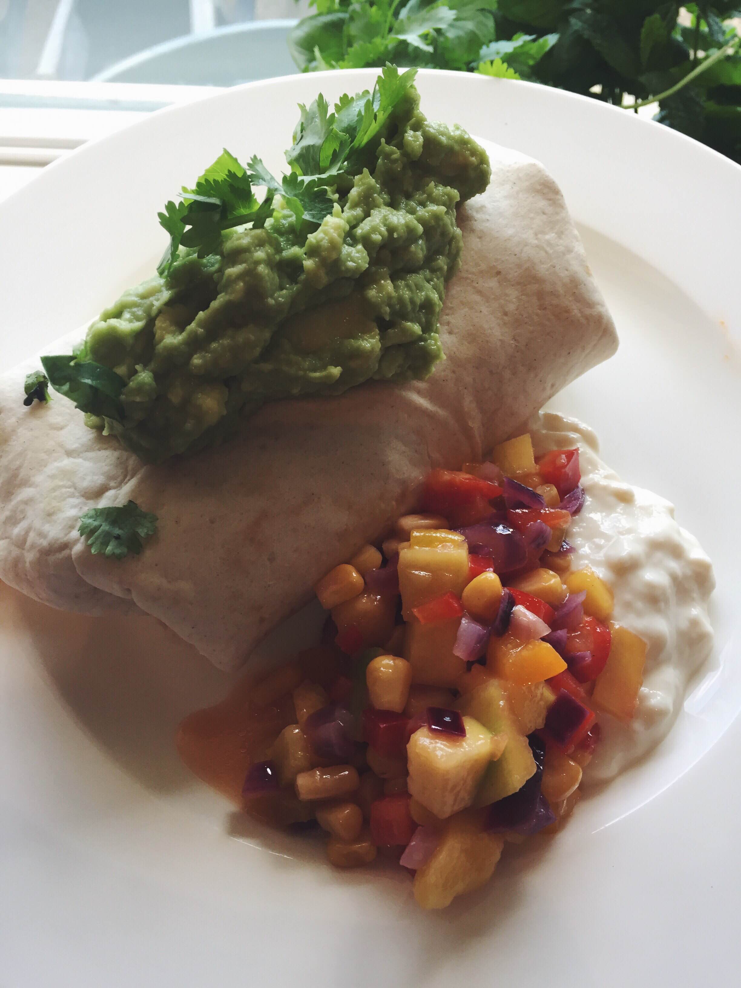 Sweet potato chilli burritos with mango, sweetcorn and red onion salsa, almond yoghurt and lotsa guac