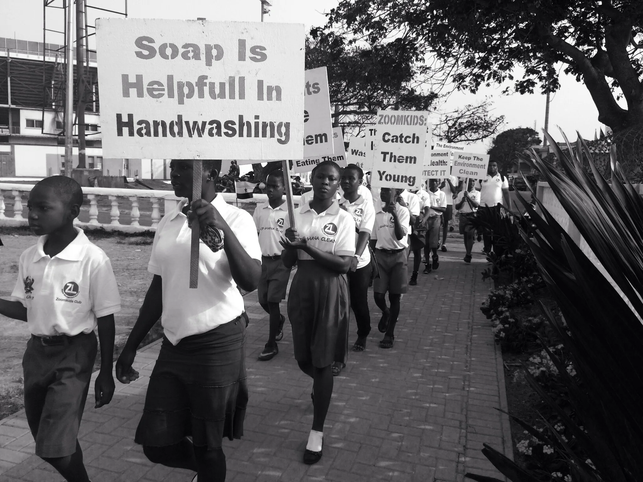 ZoomLion Kids with placards on health and environmental issues