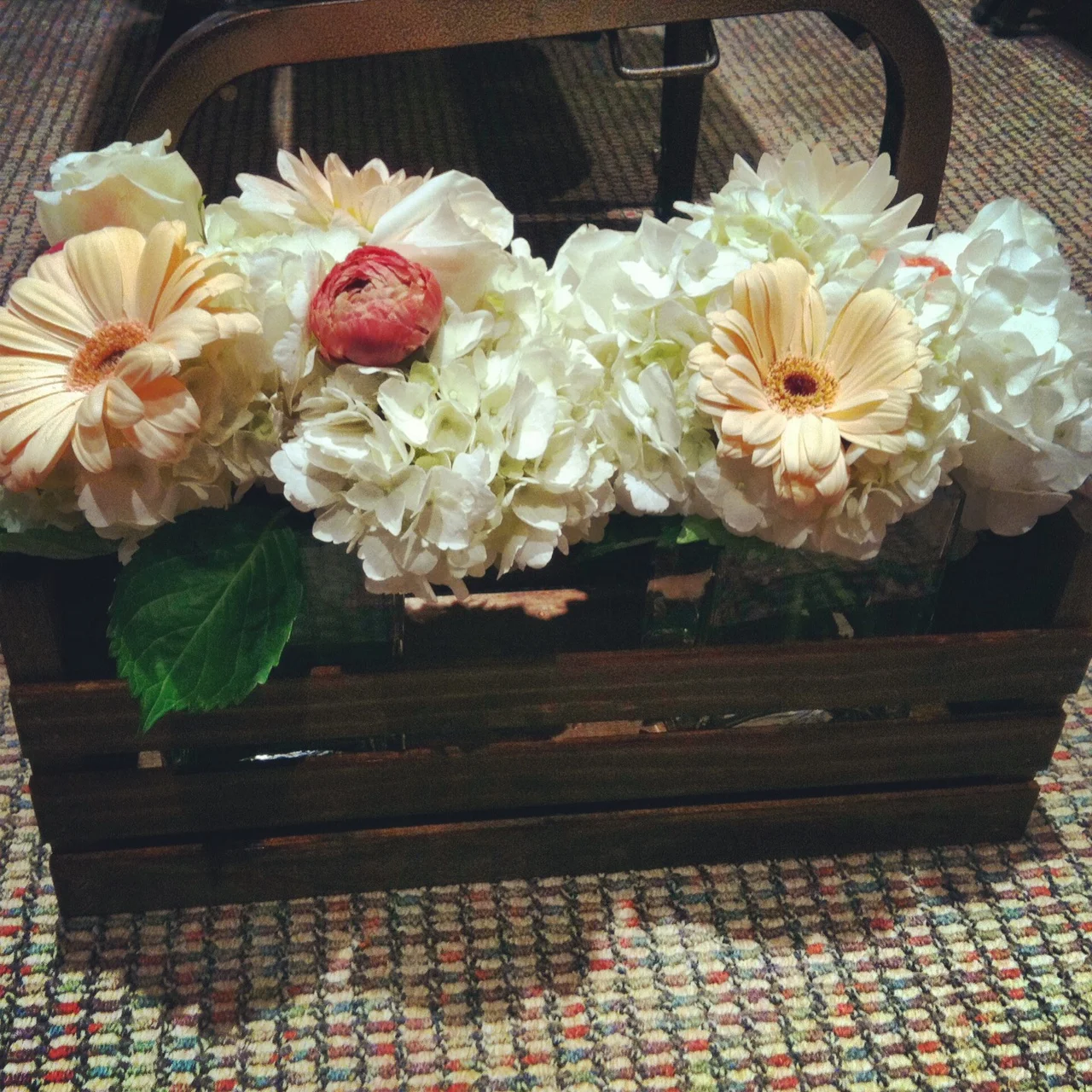 Fun fact: The mother of the bride hand made 20 of these gorgeous flower crates. 