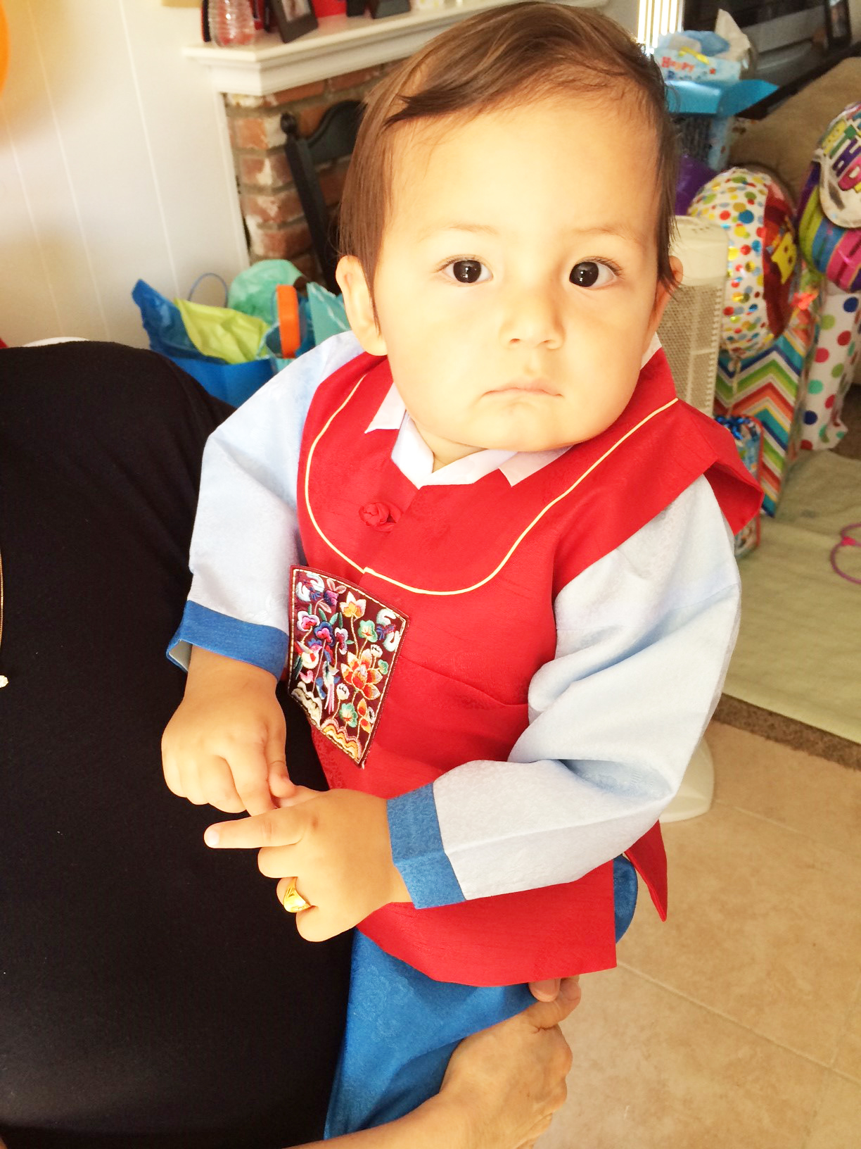 The birthday boy in his traditional korean outfit.