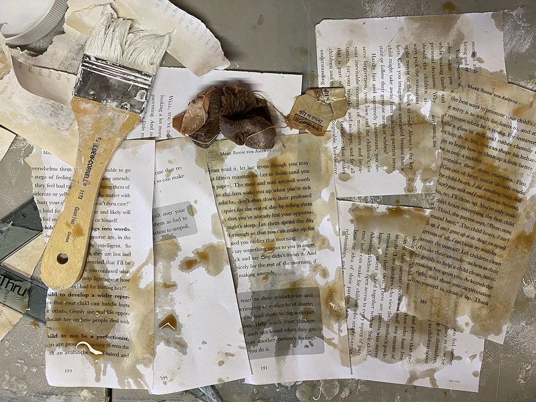 Overload process with tea, gesso, and books.