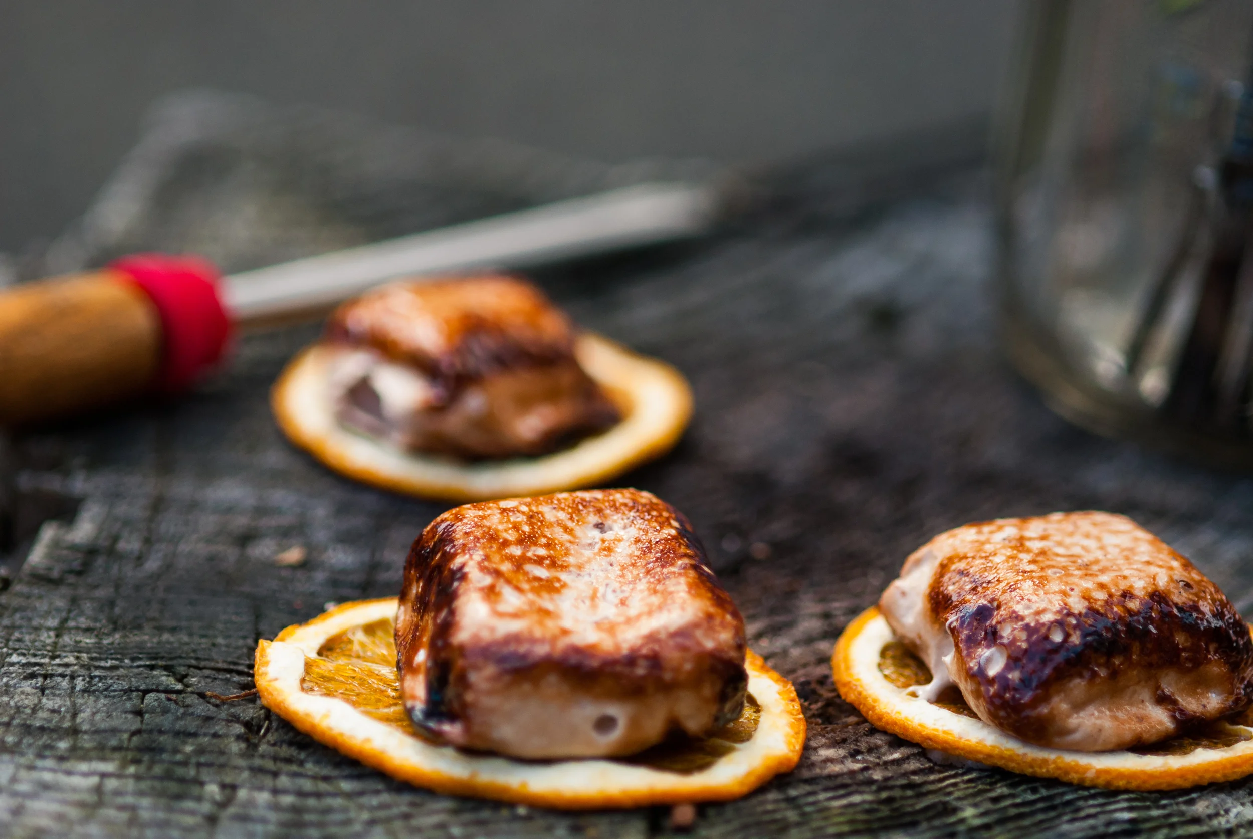 Simple & Crisp Orange topped with a toasted homemade Theo Chocolate Chipotle Spiced Marshmallow