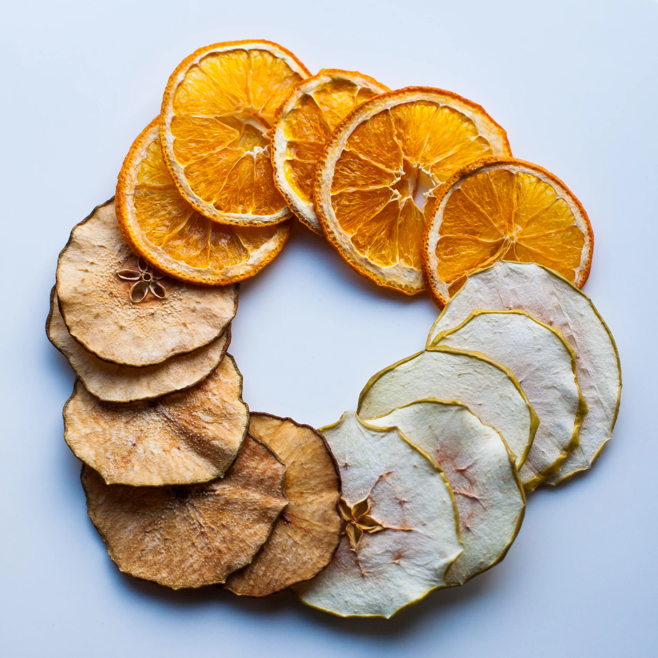 simple and crisp artisan crisps in pear, orange and apple