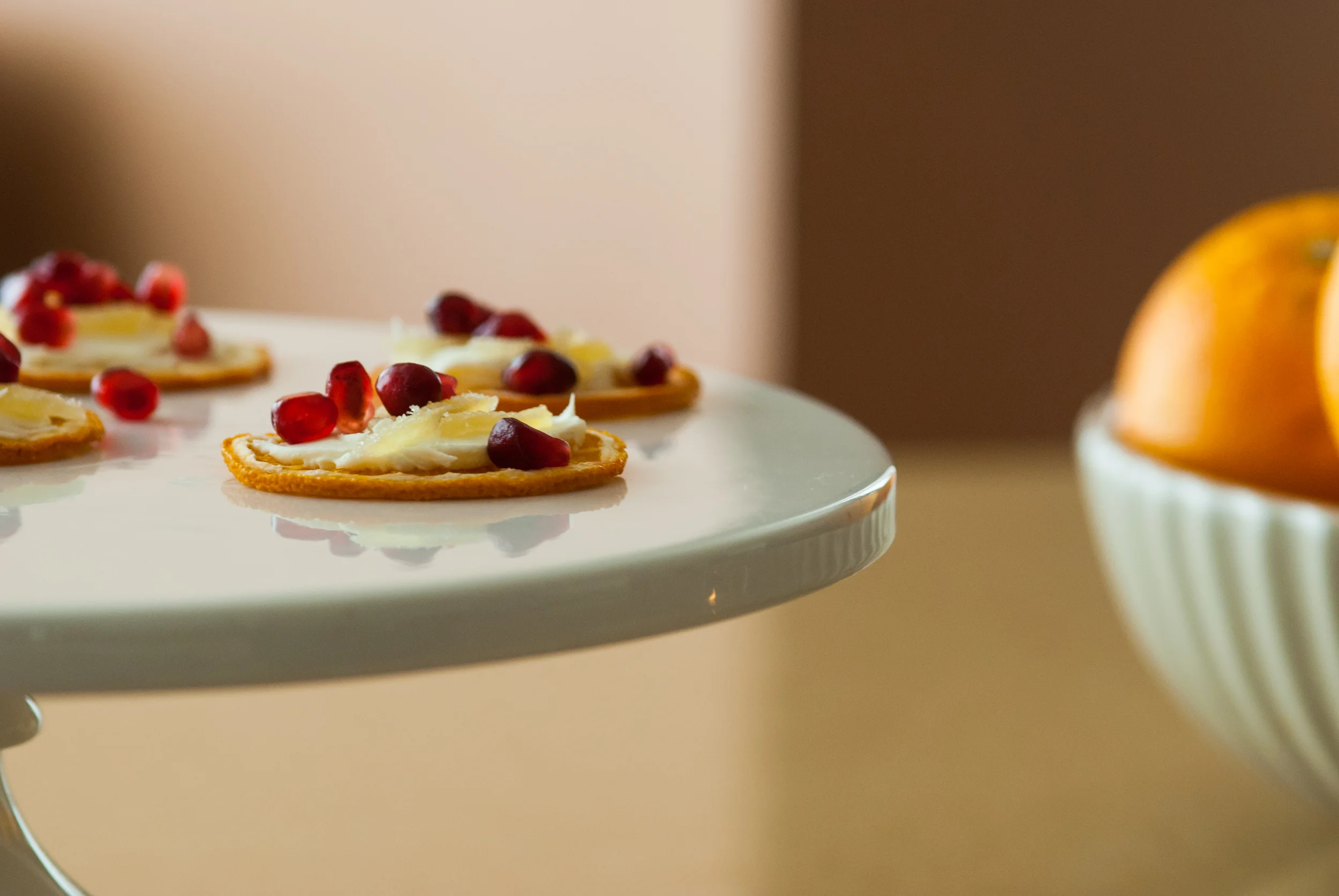 s&c orange paired with mascarpone cheese, slivers of candied ginger and pomegranate 
