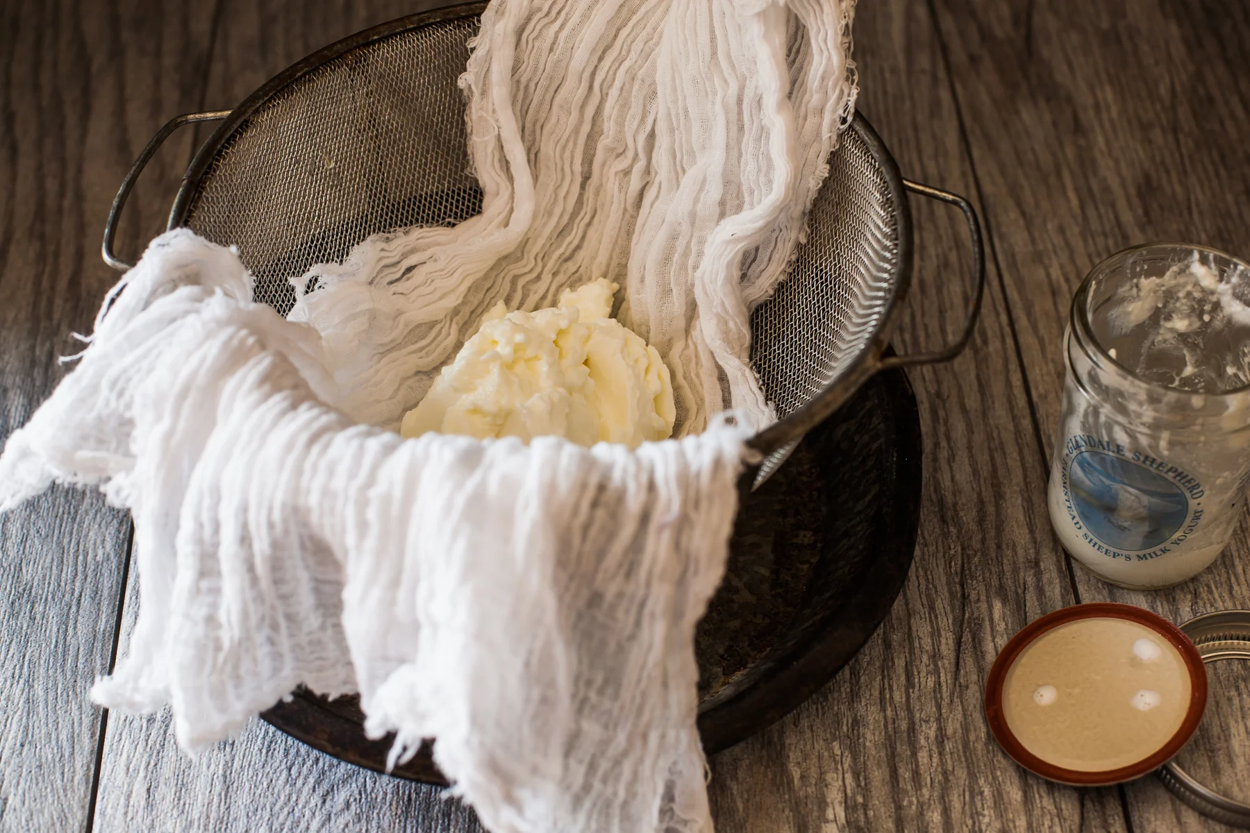 empty yogurt into cheese cloth 