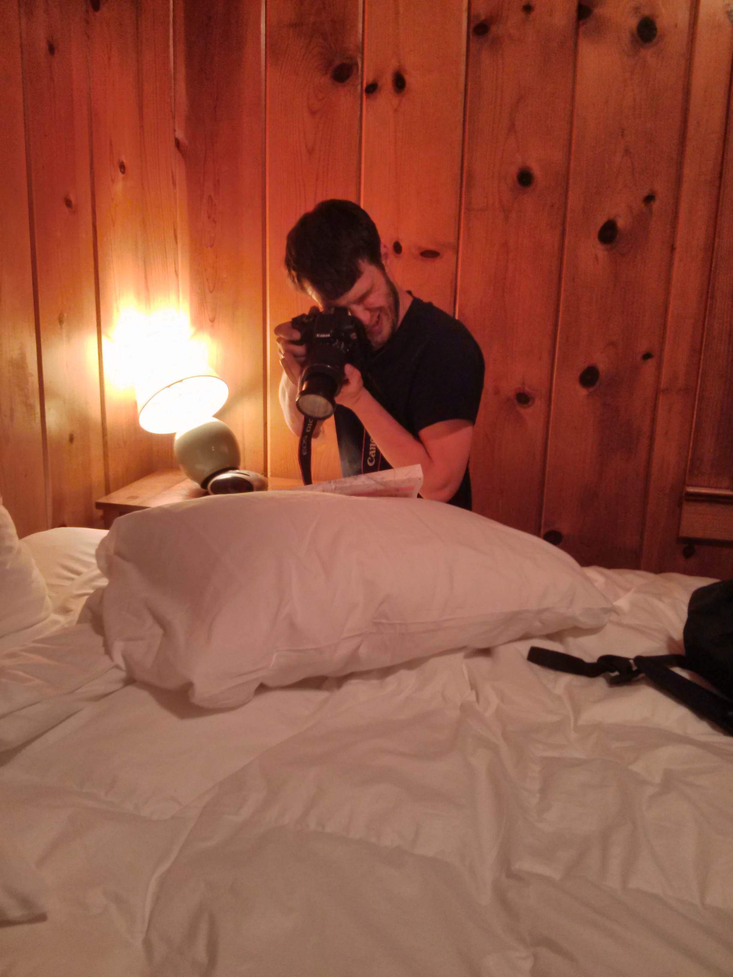Sam taking pictures of the road map for the top of a blog post. Yes, his face looks like that whenever he's taking a photo he cares about. At least it makes it easier to smile.
