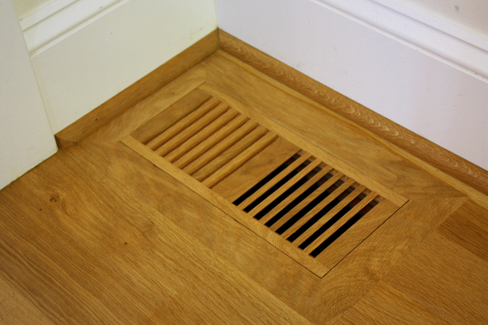  After install, our flush-mount vents blend seamlessly with the rest of the floor. 