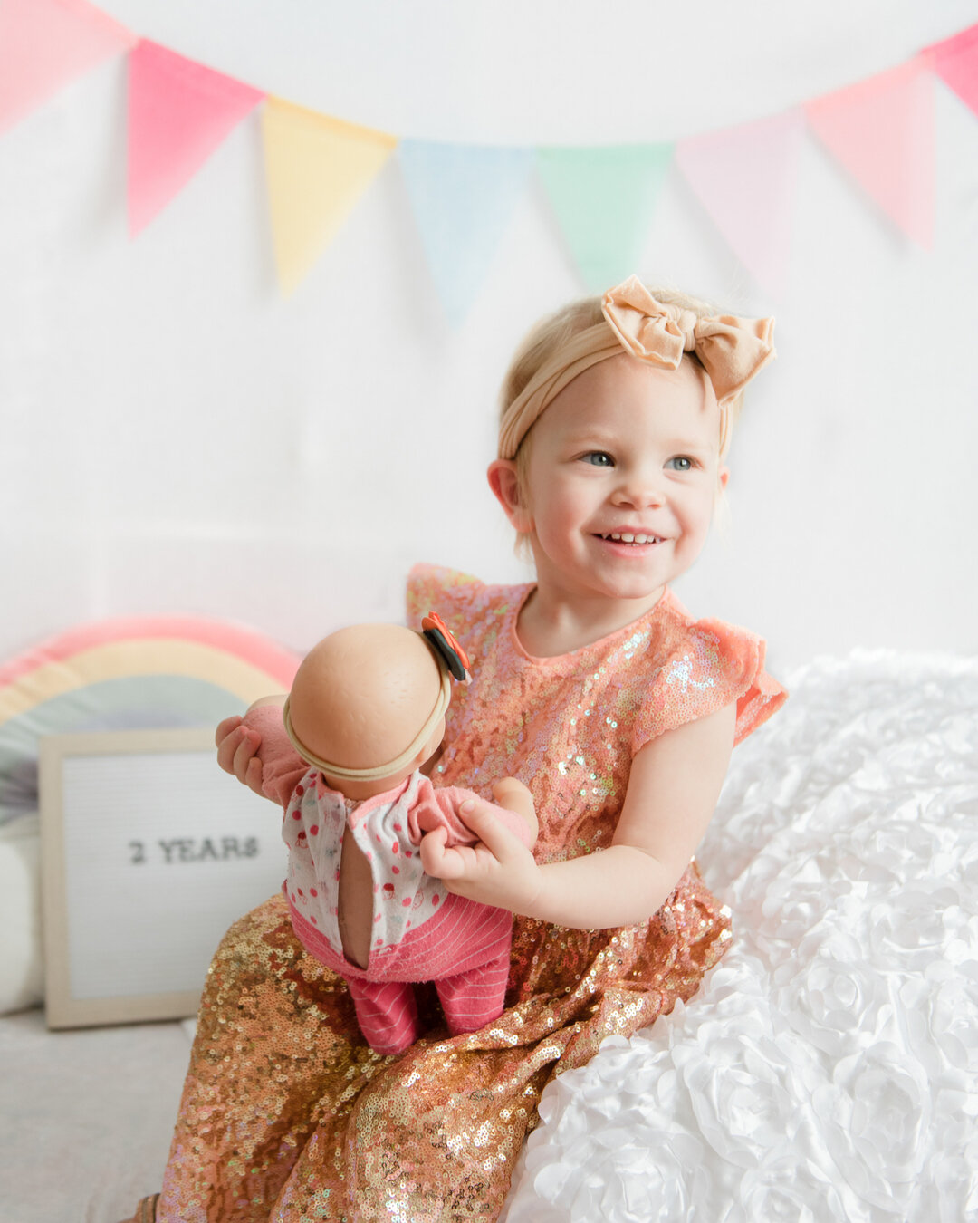 Nell turned two in November and I never posted her monthly photo! Bad mommy! This will be the last of her &quot;official&quot; monthly portraits since wrangling a toddler each month to sit for a posed photo was becoming increasingly chaotic. I'll aim