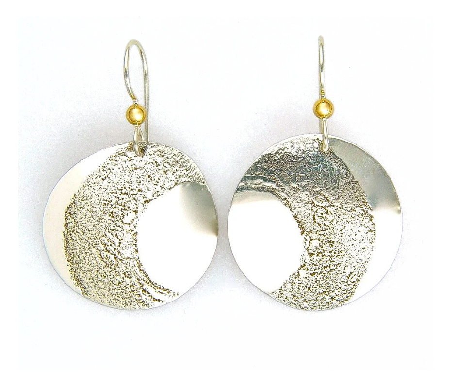 SandraDeeOwens-sterlingsilverearring-model-jewelrymodel-handmadeinvermont-sterlingsilverjewelry.png
