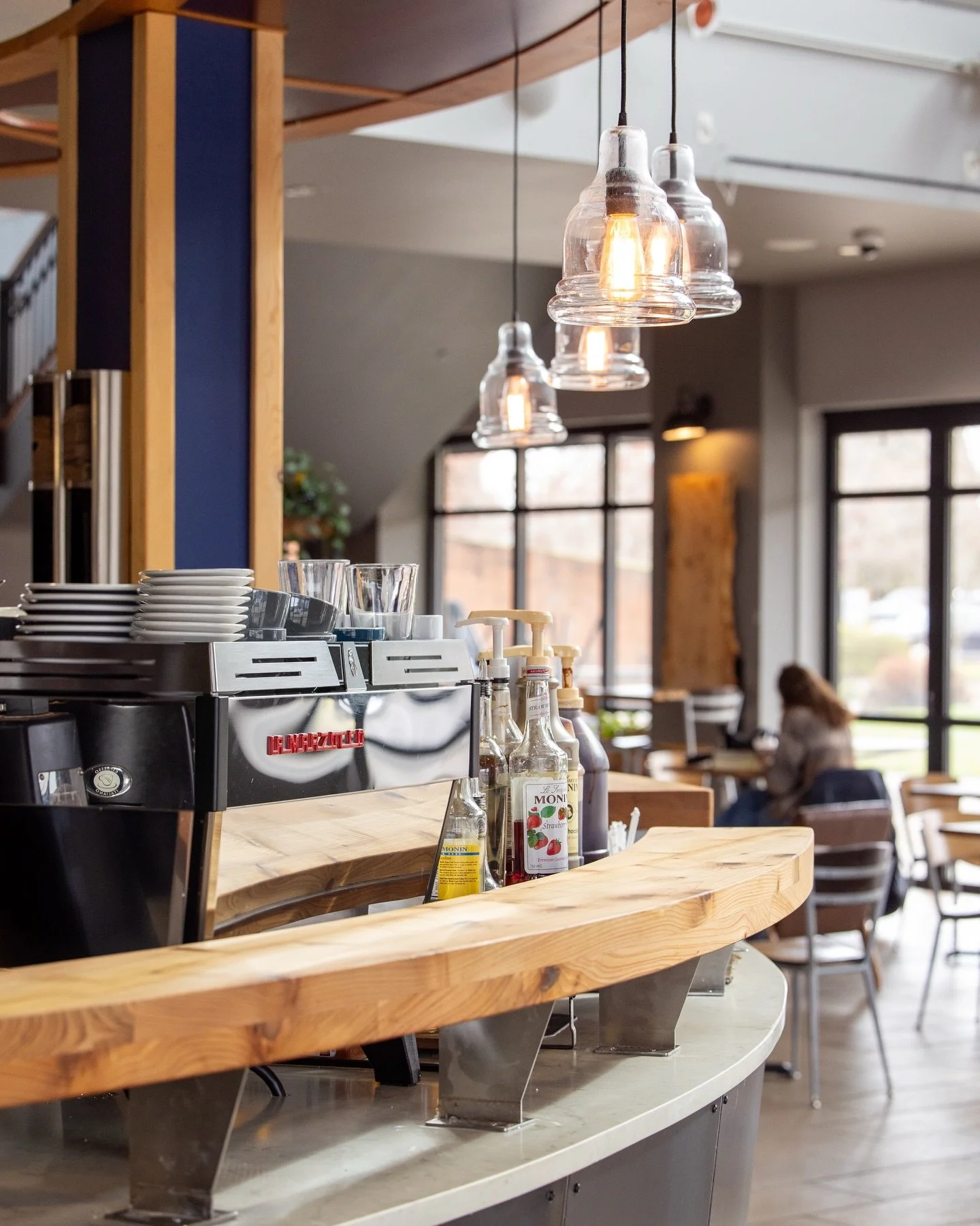 The rumors are true, things DO look different around here recently! 🕺Not only did we refresh our space with some stunning new countertops and a fresh coat of blue paint on the walls, but we also had our wooden bar top refinished! 🎉 This bar top has