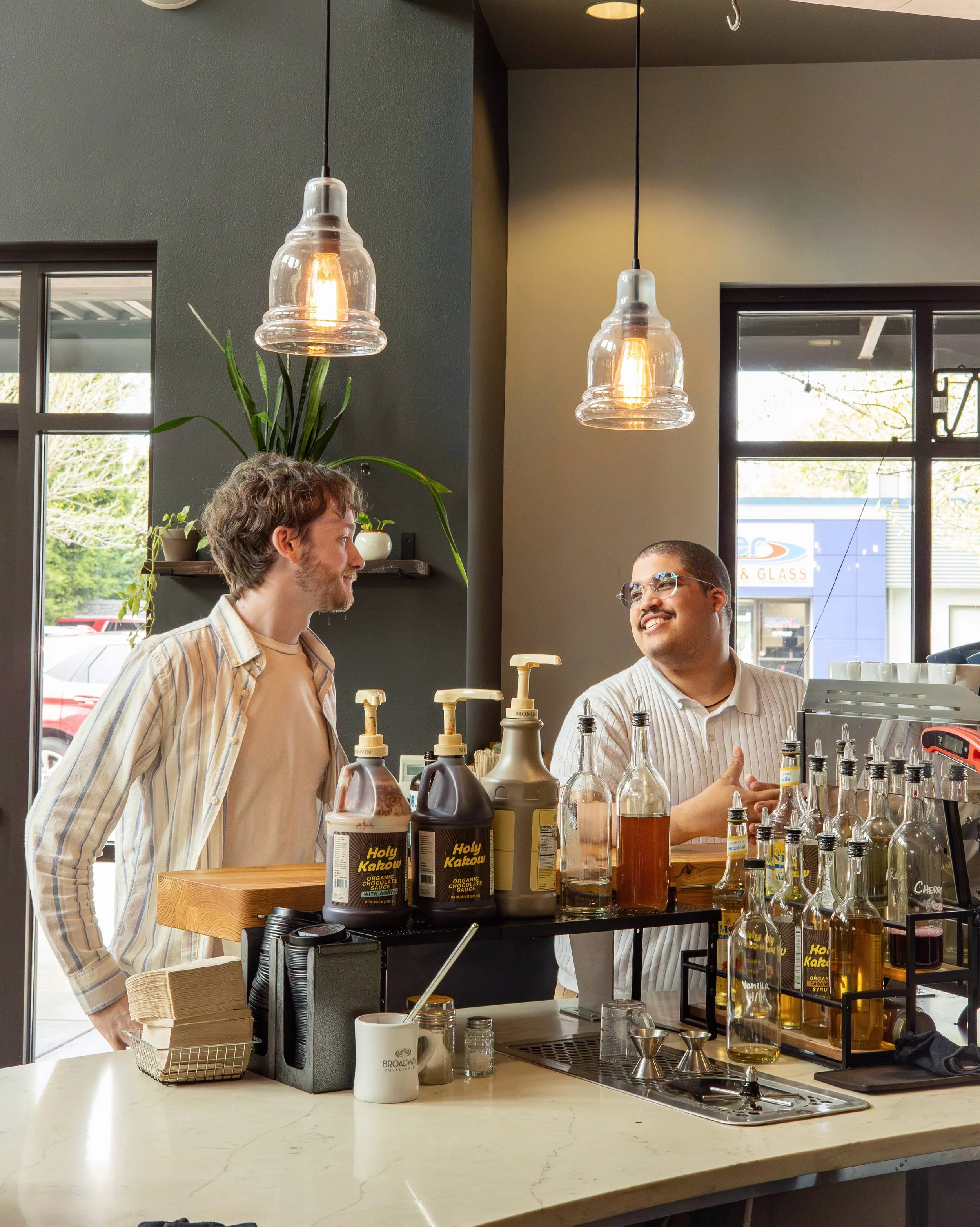 Coffee 🤝 conversation 🫶. The bar has always been a prime spot for community: a space to chit chat with fellow customers and the baristas while waiting for your drink. ☕️ We love to see the magic of coffee bringing people together ✨.