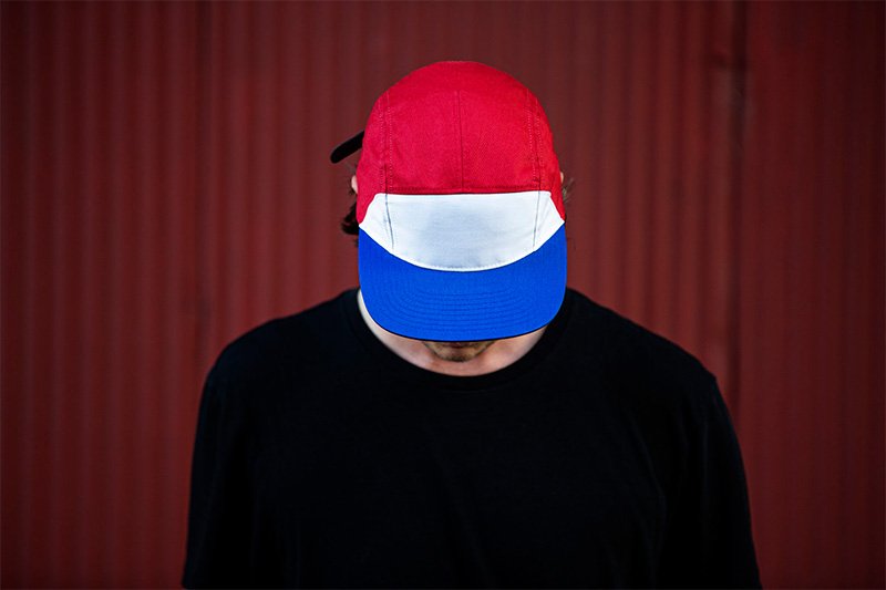 C17-CT Custom 7 Panel Camp Fit Strap Back Hat in Marble White True Red and Royal By Captuer Headwear.