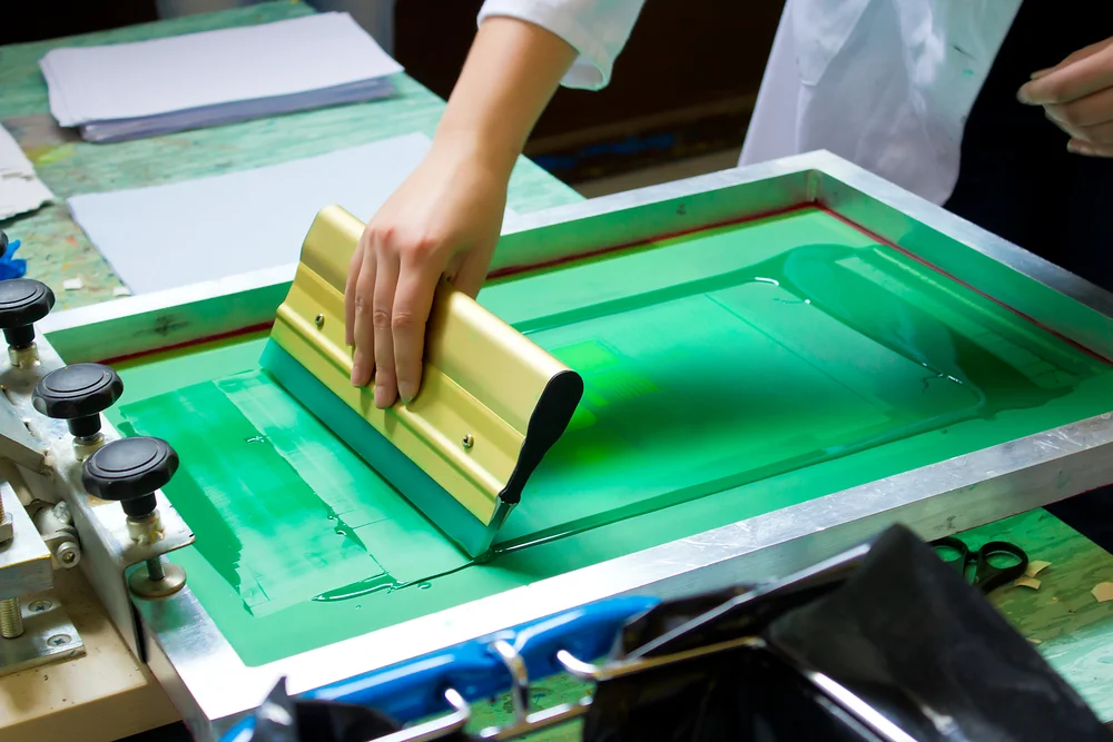 Our Screen Printing is done in house, out of our humble abode in the Littleton, Highlands Ranch area, in order to keep our costs down so we can pass those savings onto our customers!