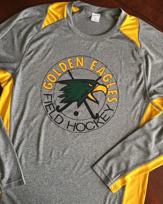 Performance moisture wicking warm up shirts for the team!