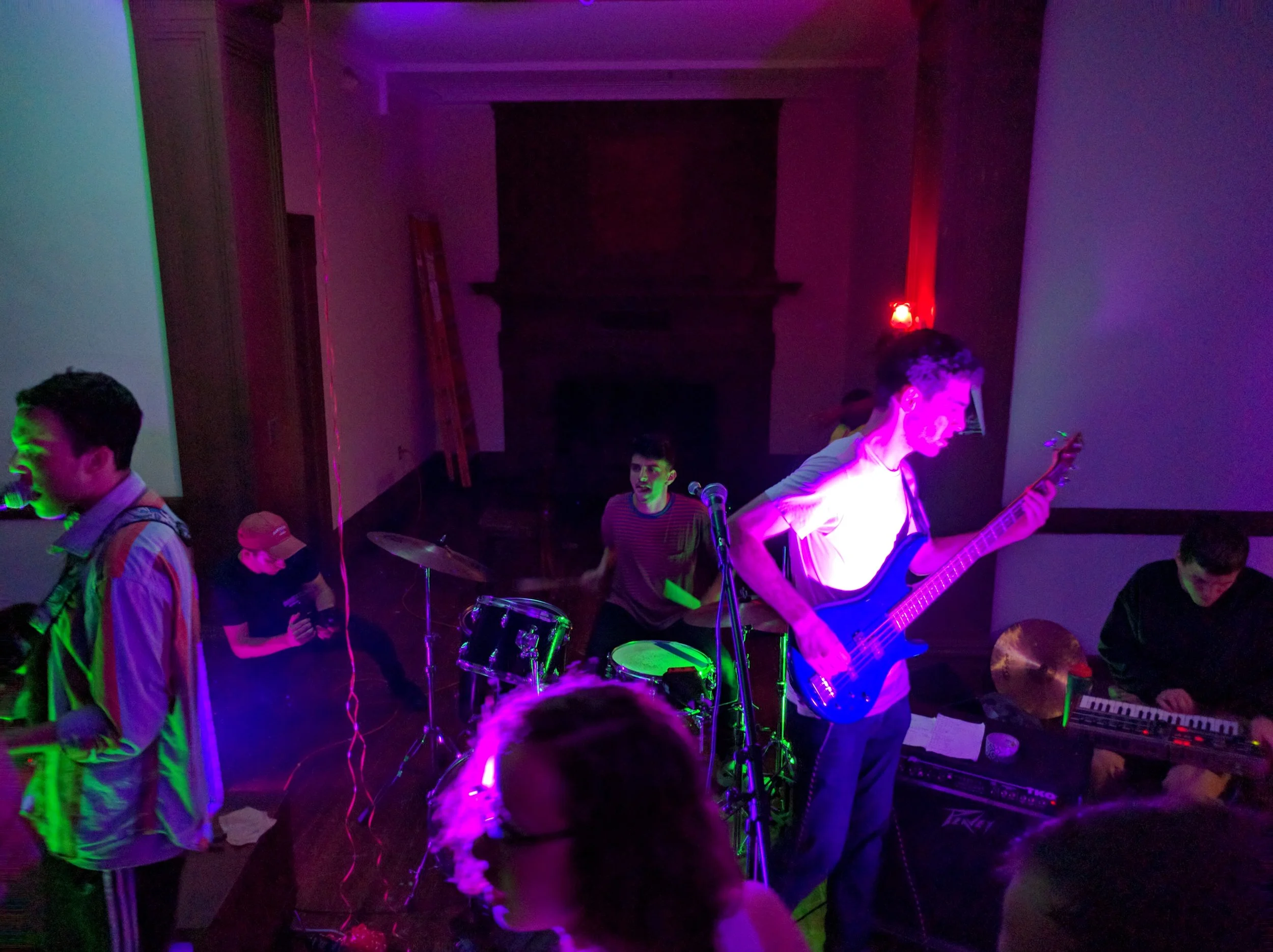 Phatrabbit take the stage for their album release show. Andrew Rock bass-boy with the deep pink Loveless look