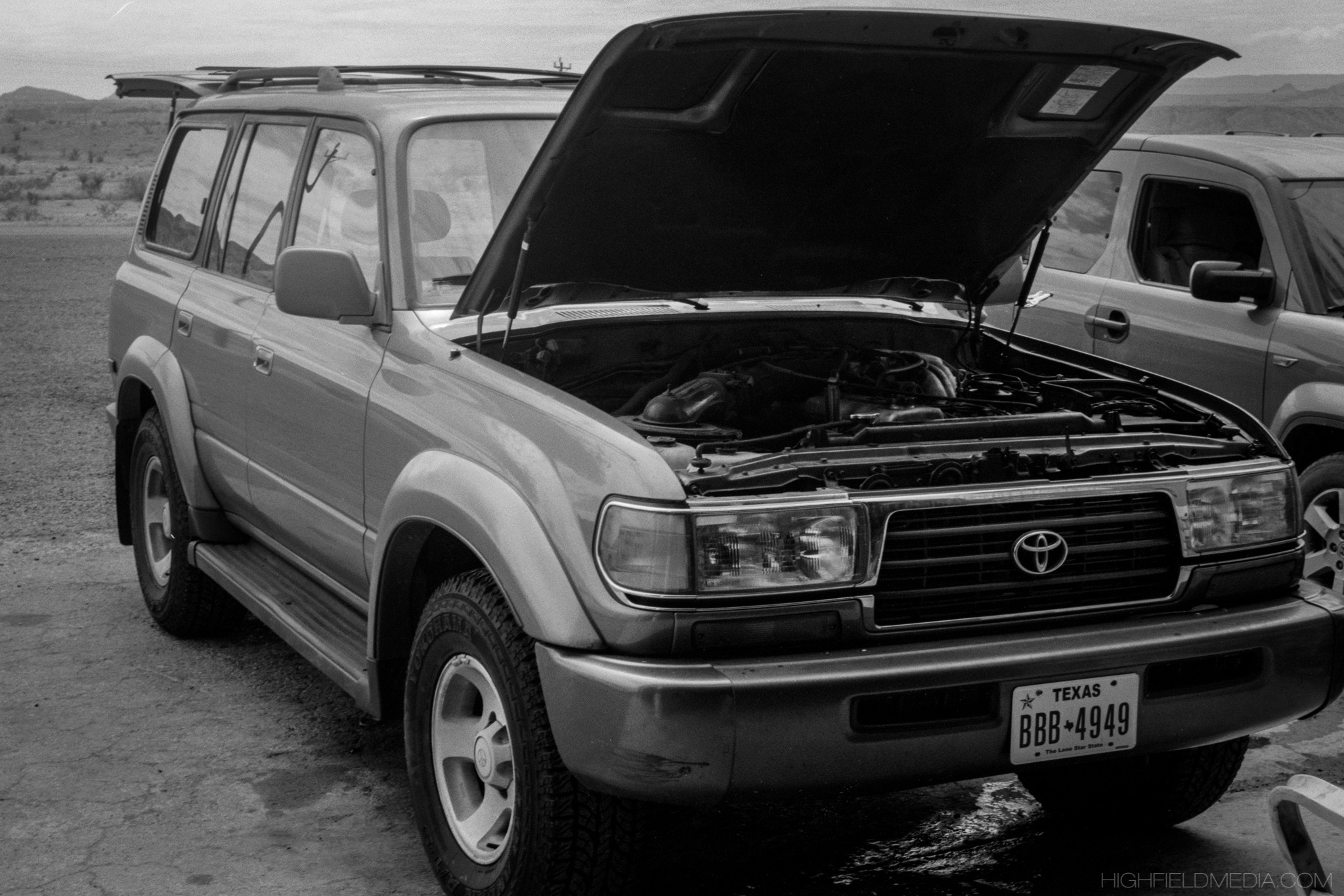 Upon arrival in Big Bend National Park, my Land Cruiser suffered a cooling system blowout. A stream of blood-red Toyota coolant trickles out from under the engine bay.