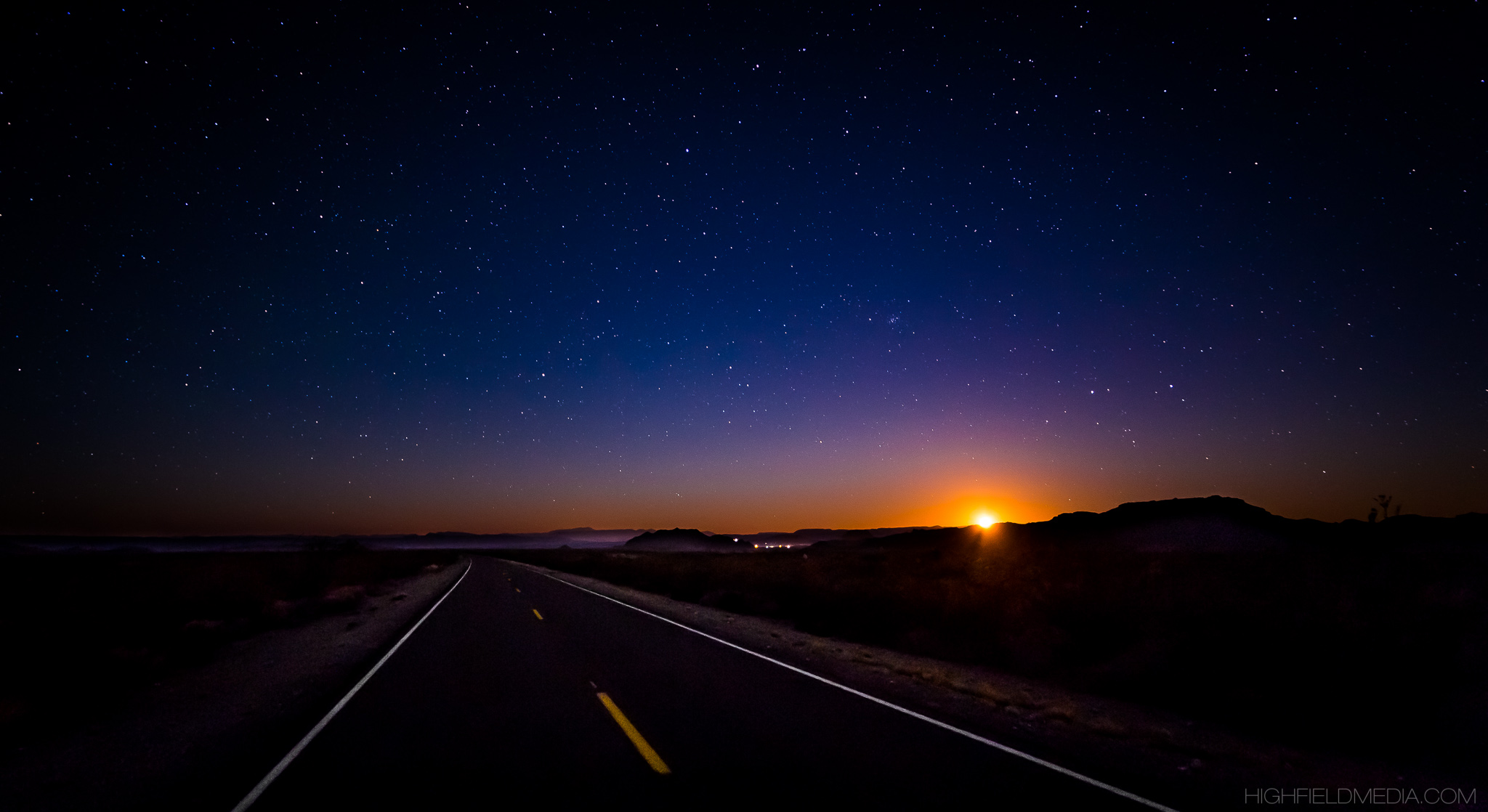 The Road to Terlingua -- A moonset over Study Butte-Terlingua as brilliant as a sunset thanks to zero light pollution and ideal atmospheric conditions. Prints may be purchased on the Shop page.