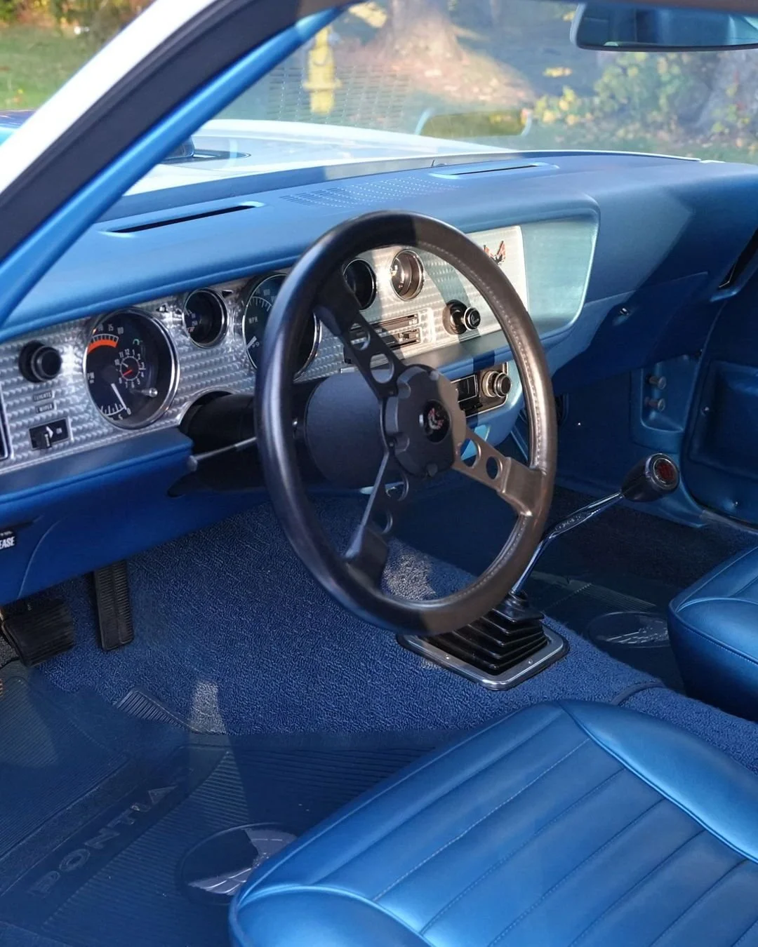 A race-bred cockpit that set the tone. This interior traces its roots to &rsquo;69, carrying over the purposeful design and driver-first layout that defined the early Trans Am experience.