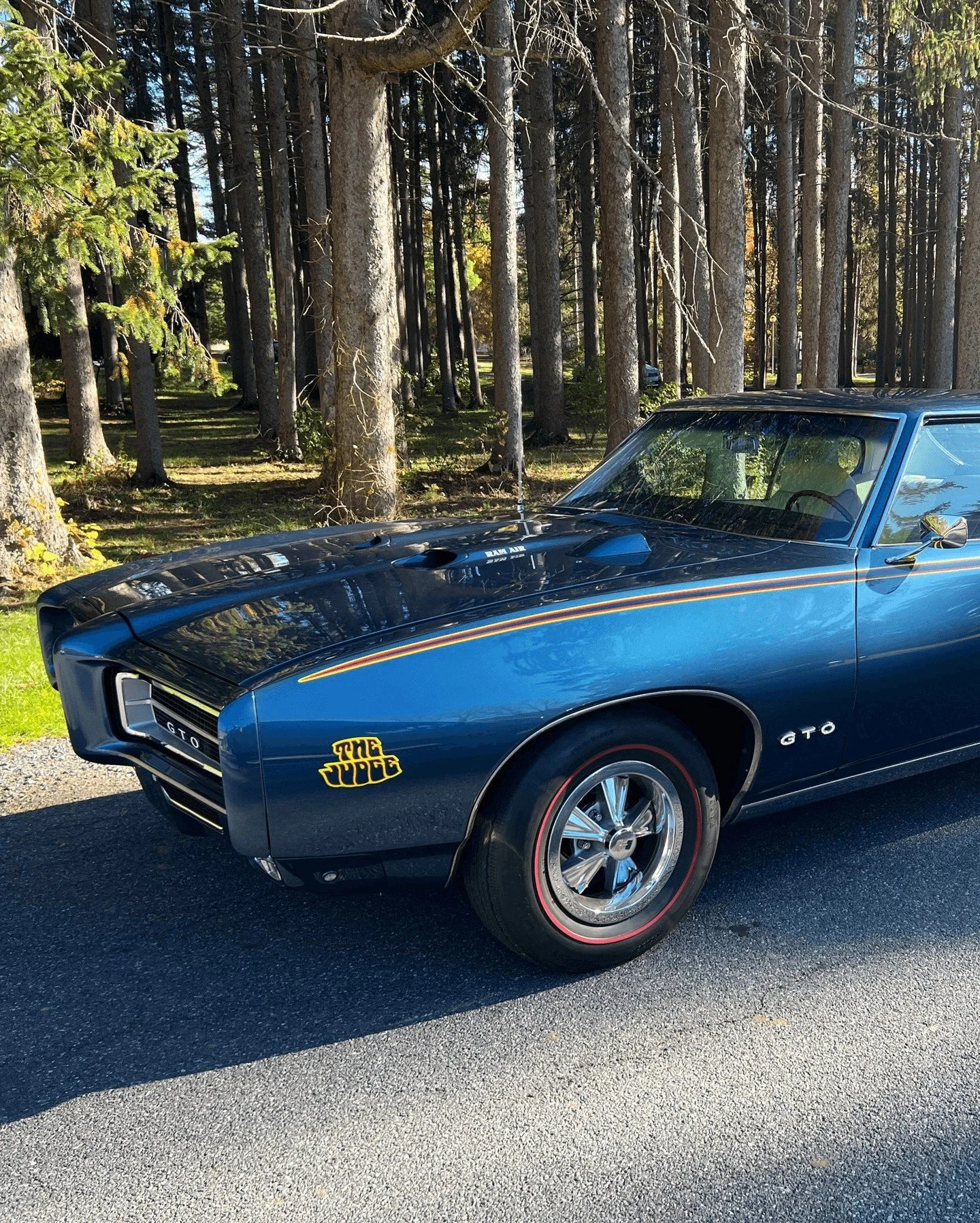1969 Pontiac GTO Judge - Liberty Blue: Under its sculpted hood, the Judge carried Pontiac&rsquo;s Ram Air III 400-cubic-inch V8 rated at 366 horsepower and paired with a four-speed manual transmission