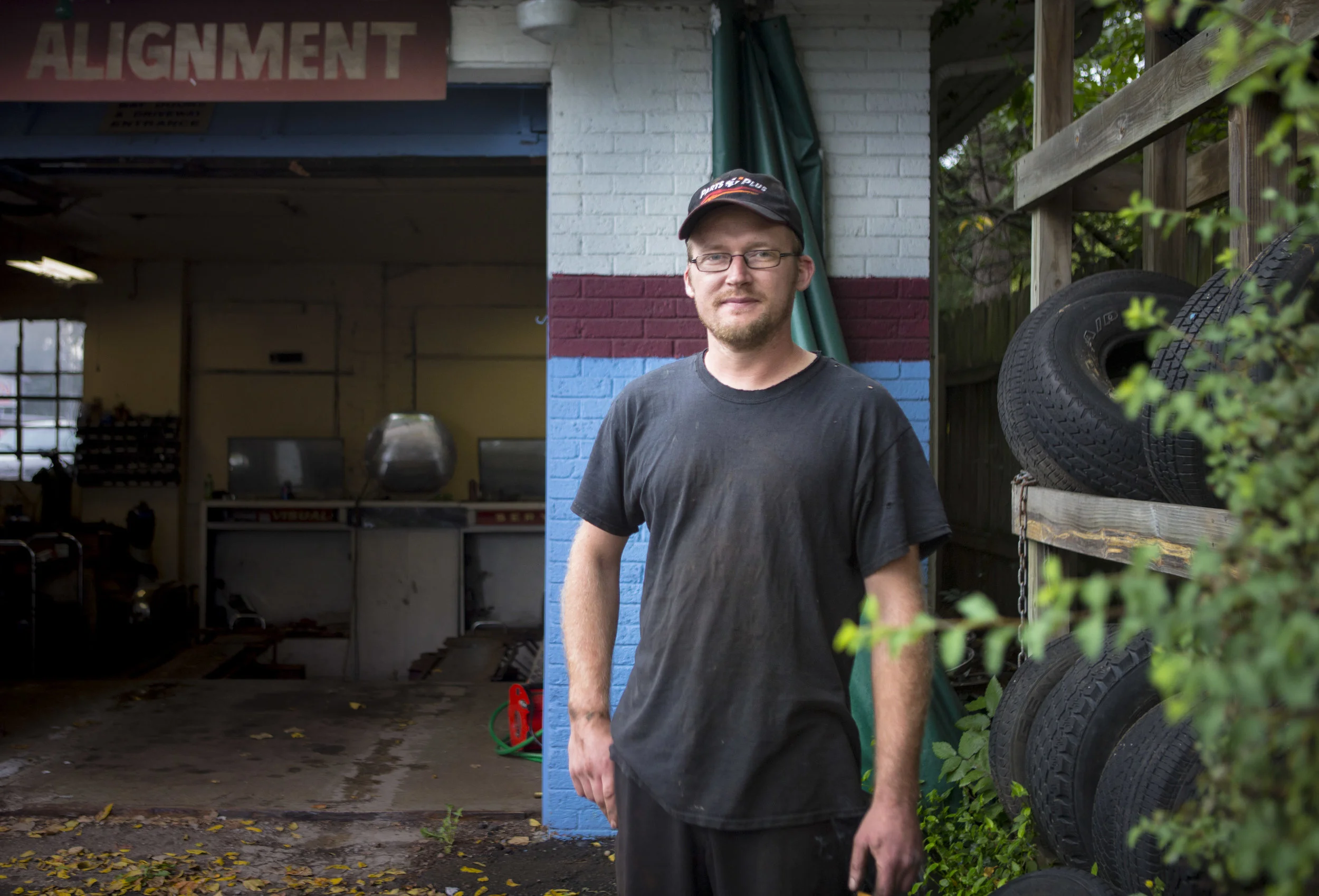 JEREMY, THE MECHANIC &nbsp; // &nbsp;Lansing, Michigan“I don’t follow it… Never voted.”Just around the corner from Old Town in Lansing, Michigan, Jeremy works in his uncle’s auto shop, the stub of a cigarette in his hand.Jeremy is a single father an…