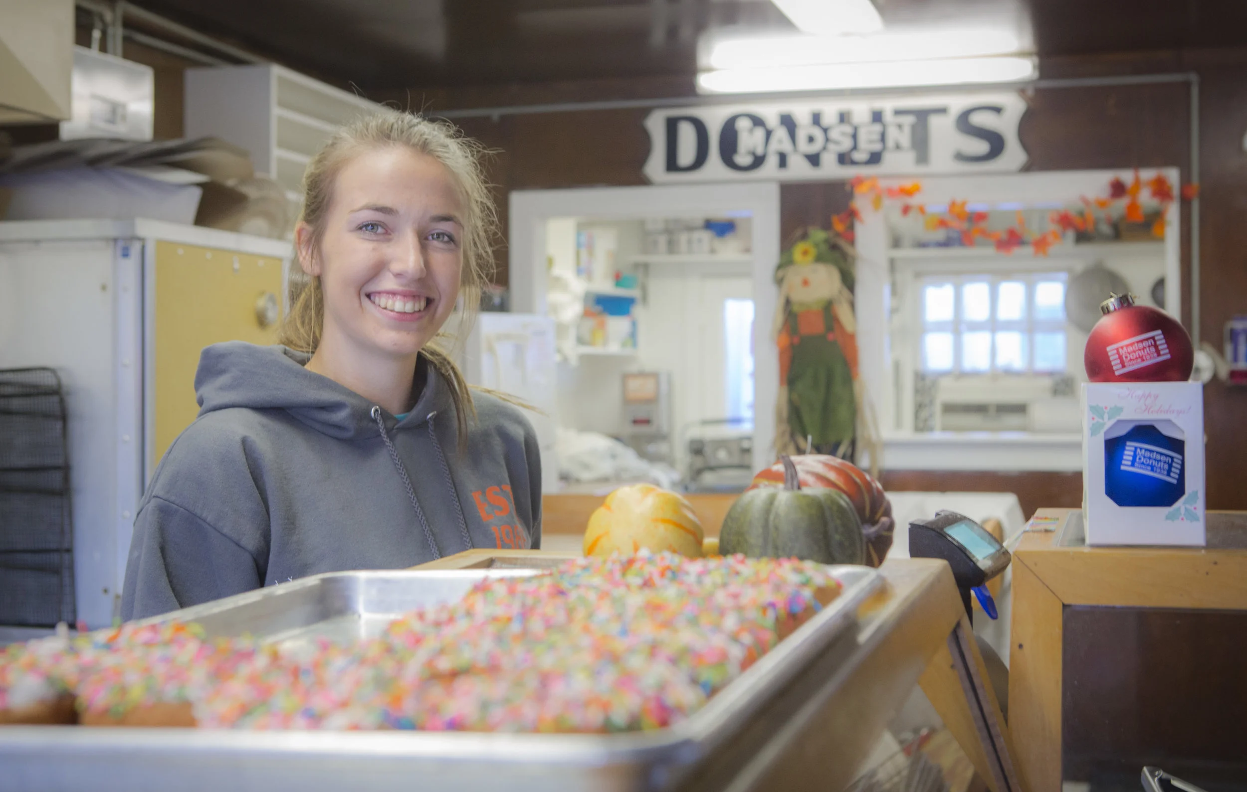 BAILEY, THE DECORATOR &nbsp; // &nbsp;Geneva-on-the-lake, Ohio“So many kind people here, but every now and then you get a sour apple.”Madsen’s Donuts&nbsp;looks and feels like everything you’d want from a donut shop — cozy, warm, and an aroma that s…