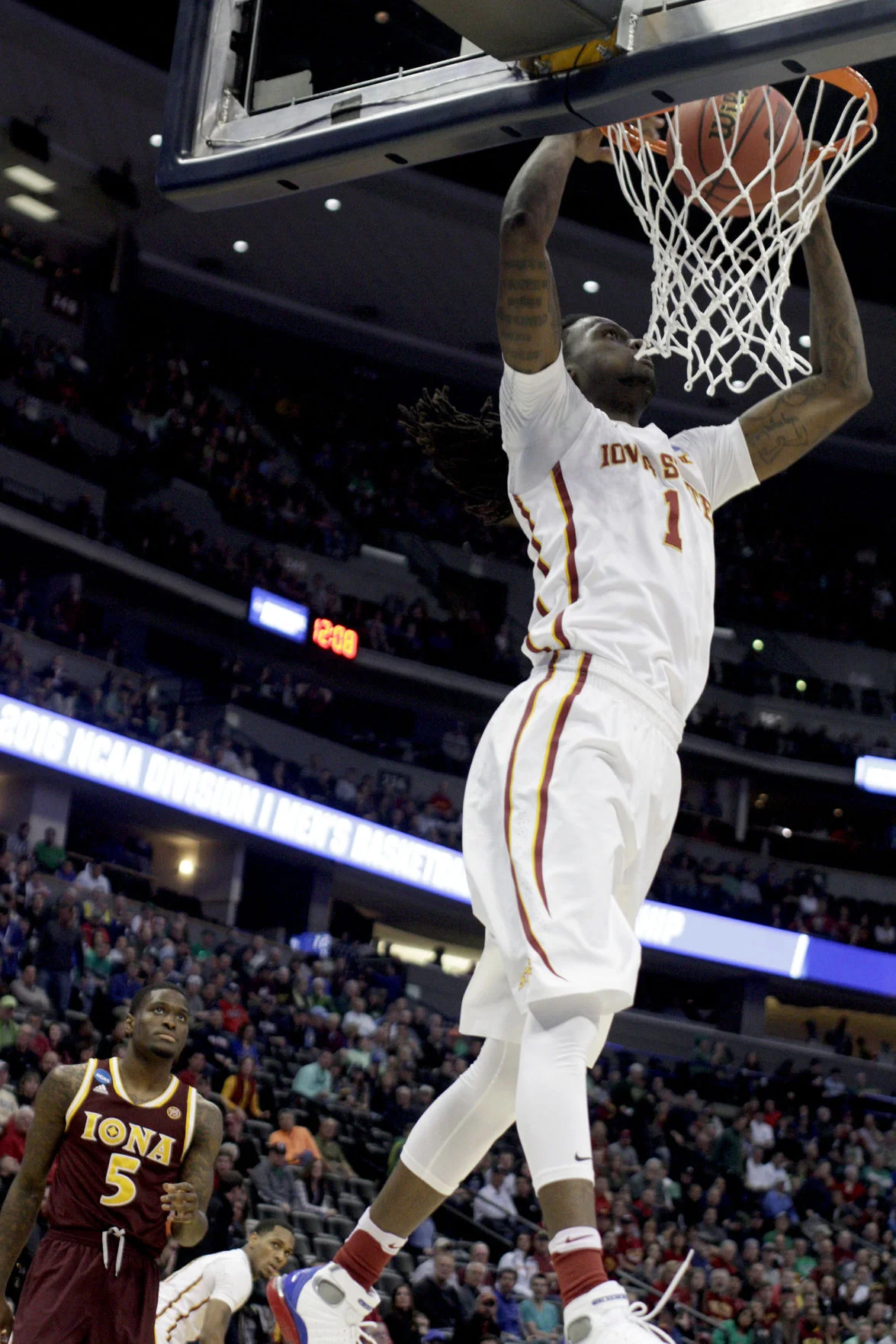 Senior Jameel McKay dunks the ball in the first round of the NCAA Tournament at the Pepsi Center in Denver. Photo by: Lani Tons/Iowa State Daily.