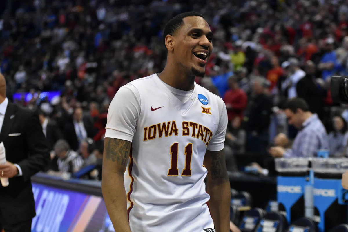 Point guard Monté Morris smiles as he heads to the locker room after the Cyclones 78-61 win over Little Rock in the second round of the NCAA Tournament at the Pepsi Center in Denver. Photo by: Lani Tons/Iowa State Daily