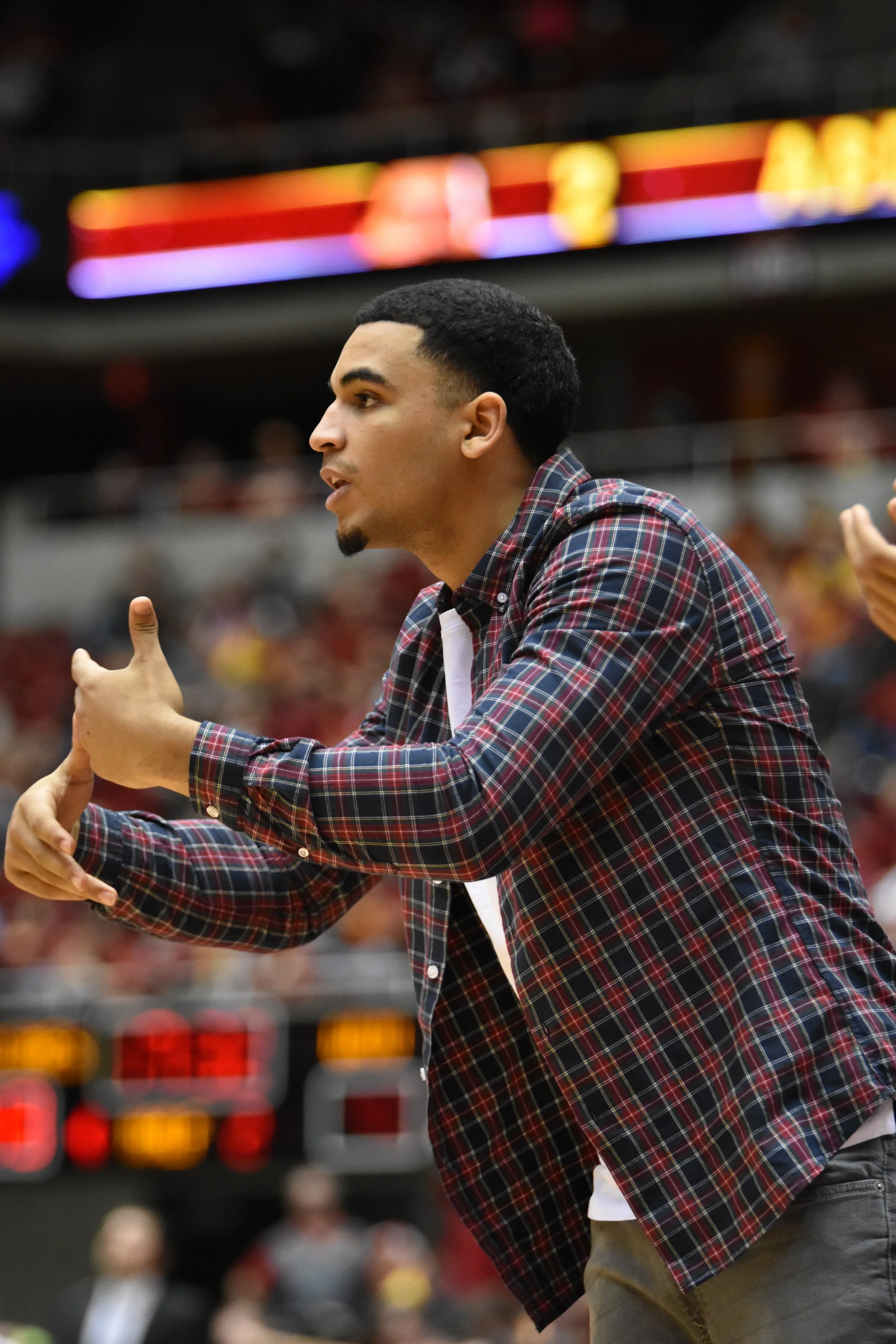 Naz Mitrou-Long gives advice to a teammate immediately after a timeout during a game in the 2015-2016 season. Photo by Lani Tons/Iowa State Daily