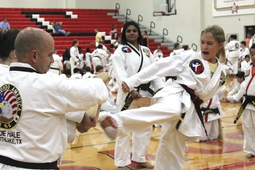 Our students get to break real wooden boards. It's a great way to motivate them.