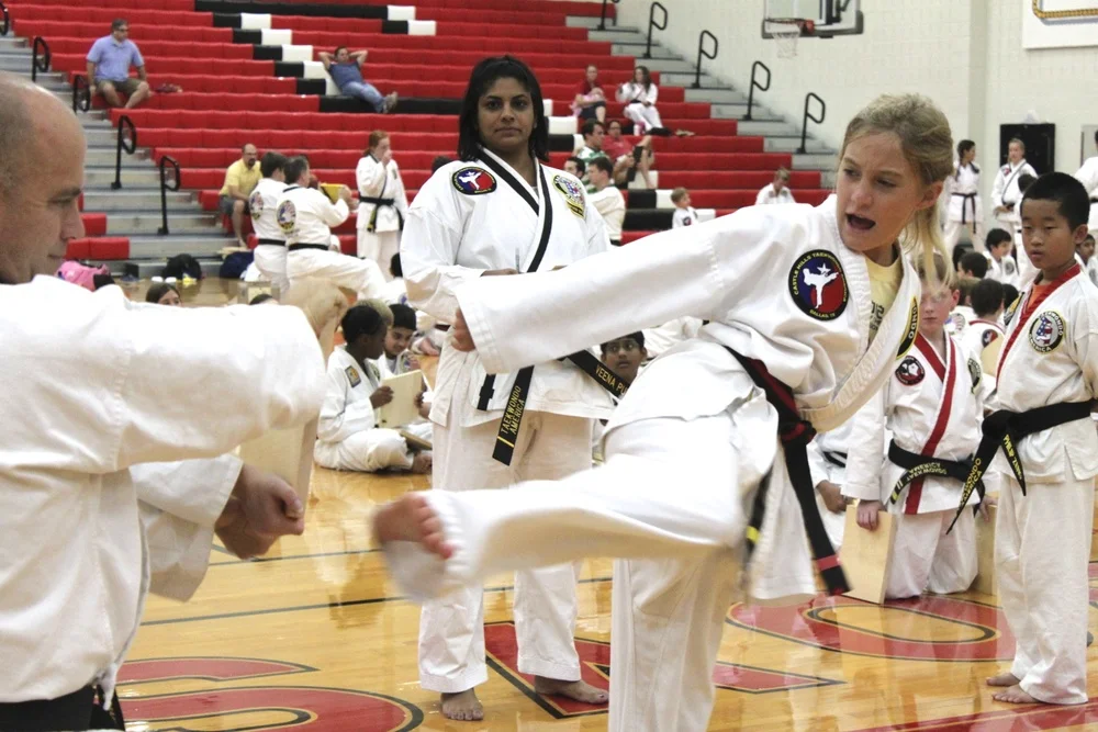 Taekwondo Karate Instructors and students at a martial arts Regional Belt Test.