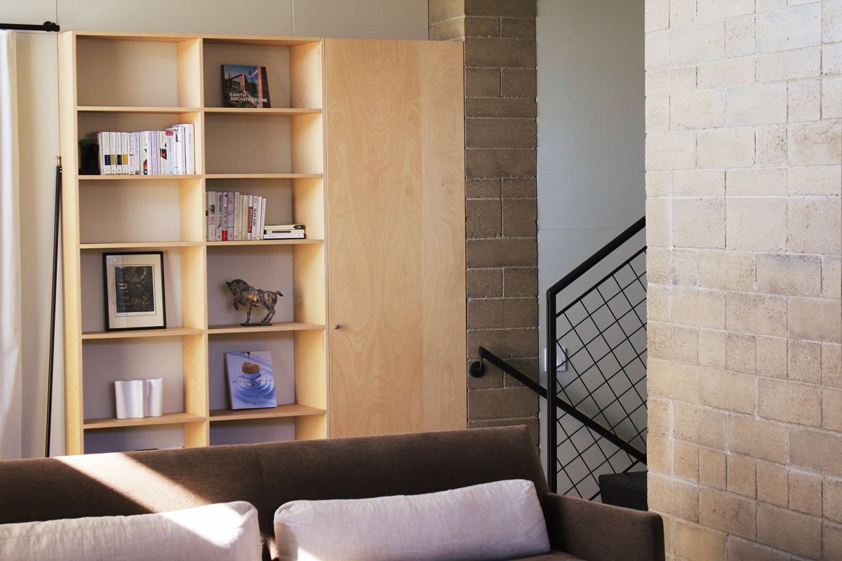 Home constructed entirely of Watershed Block after a strong magnitude 6.0 earthquake. No structural damage is observed to any part of the home or its contents. Amazingly, the books and contents of the bookshelf remained intact.