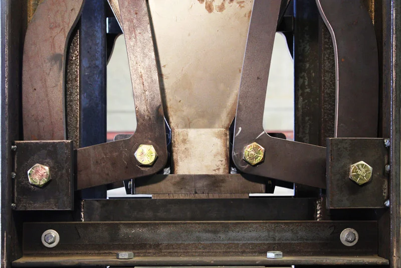 Archimedes’ lever pivoted on a fulcrum. The Watershed levers rotate around case hardened one inch pins. Version 1.0, like most prototype original machines, is bolted together. Version 2.0, expected out in late summer 2015, will be water-jetted and pressure fit.