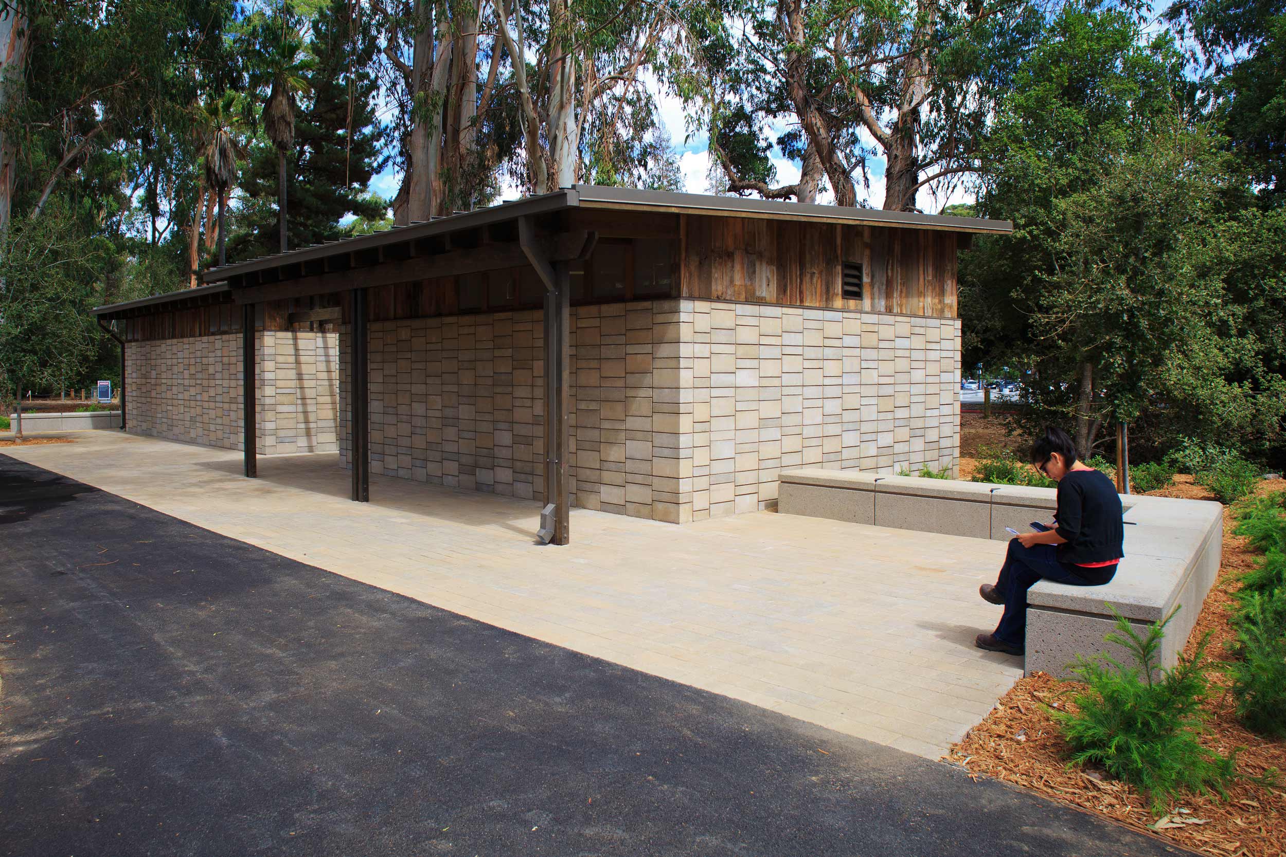 Doorman Associates specified stacked bond with deeply raked horizontal joints using four, six and eight inch blocks, a clever and novel application for structural block. The Stanford Watershed Block meets ASTM C90 specifications for compressive strength, linear shrinkage and maximum absorption requirements, all while using less cement, reducing embodied energy, and incorporating unwashed, locally sourced aggregates. Beauty and sustainability are woven together for a new age of masonry. Image © SkyHawk Photography - Brian Haux .