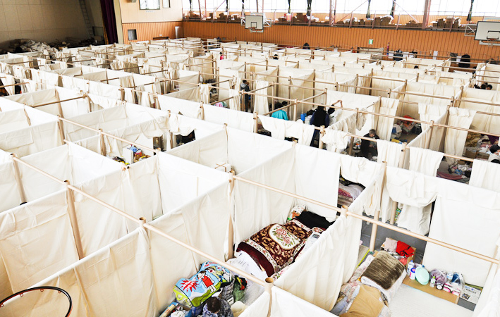 After the 2011 earthquakes and tsunami in Japan, architect Shigeru Ban designed his fourth iteration of the Paper Partition System to provide privacy in existing emergency shelters. Constructed from paper tubes, canvas sheets, and safety pins, these pop-up partitions were financed with donations from around the world.
