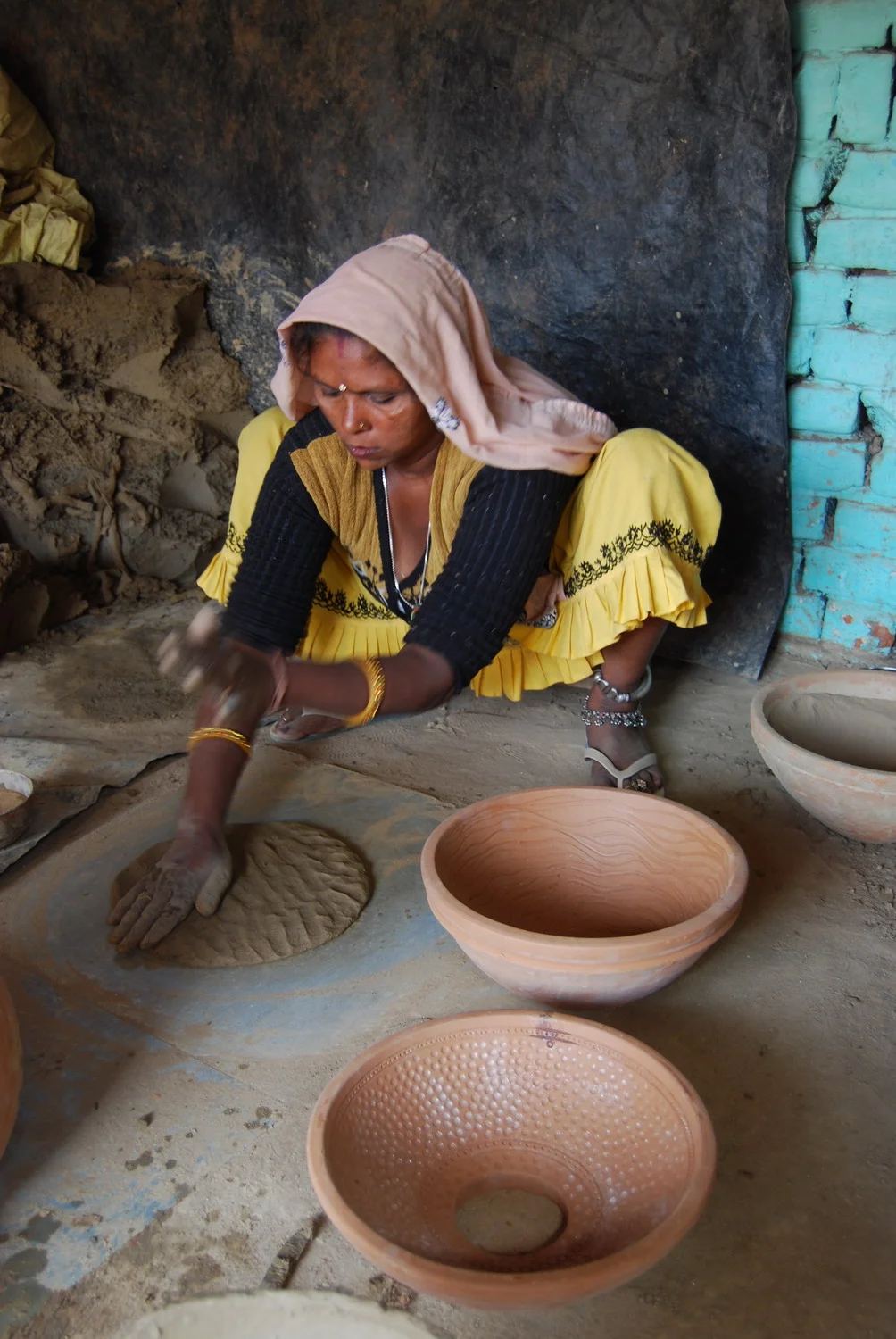 Vidya Devi making stack element from mould