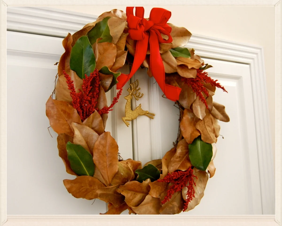 magnolia wreath magnolia leaves . grapevine wreath . fabric ribbon . Christmas picks . hot glue gun