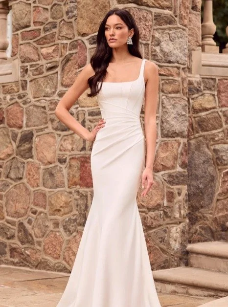 New arrivals have just reached the boutique!

1. The Paloma Blanca P5183 is a stunning fit and flare gown featuring a sleeveless Charmeuse Satin bodice with a wide square neckline. The design includes a natural Italian Tulle back with exposed boning 