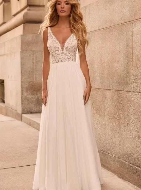 Just arrive ❤️

Chiffon and Raschel Lace Wedding Dress. Sleeveless lace bodice lined with Natural Italian Tulle, plunging V-neckline, and empire waist seam on bodice. Lace trim along neckline, empire and waist seam. Full gathered Chiffon skirt with d