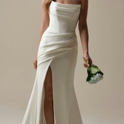 Another new arrival!

Meet Kailani by Rebecca Ingram. There is something truly "modern Renaissance" about this Basque waist crepe cowl wedding dress&mdash;it feels like divine intervention.

I wanted to share this piece with you as it captu