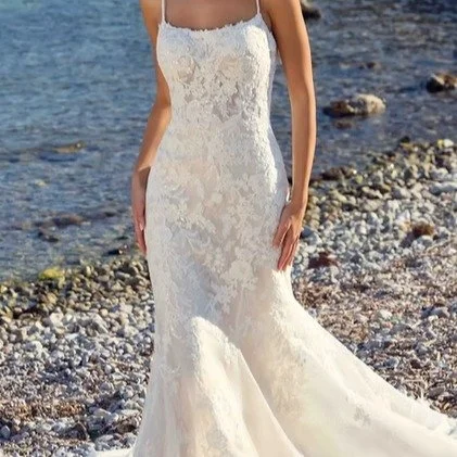 New in Shop!

The Eddy K Bellina, DR2714. This luxurious fit-and-flare wedding dress from the Dreams Collection features ivory corded lace with a sequin overlay on Chantilly lace. The gown is further detailed with a skin-tone illusion back and delica