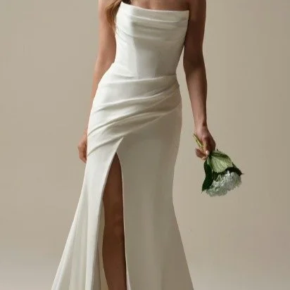 Another new arrival!

Meet Kailani by Rebecca Ingram. There is something truly "modern Renaissance" about this Basque waist crepe cowl wedding dress&mdash;it feels like divine intervention.

I wanted to share this piece with you as it captu