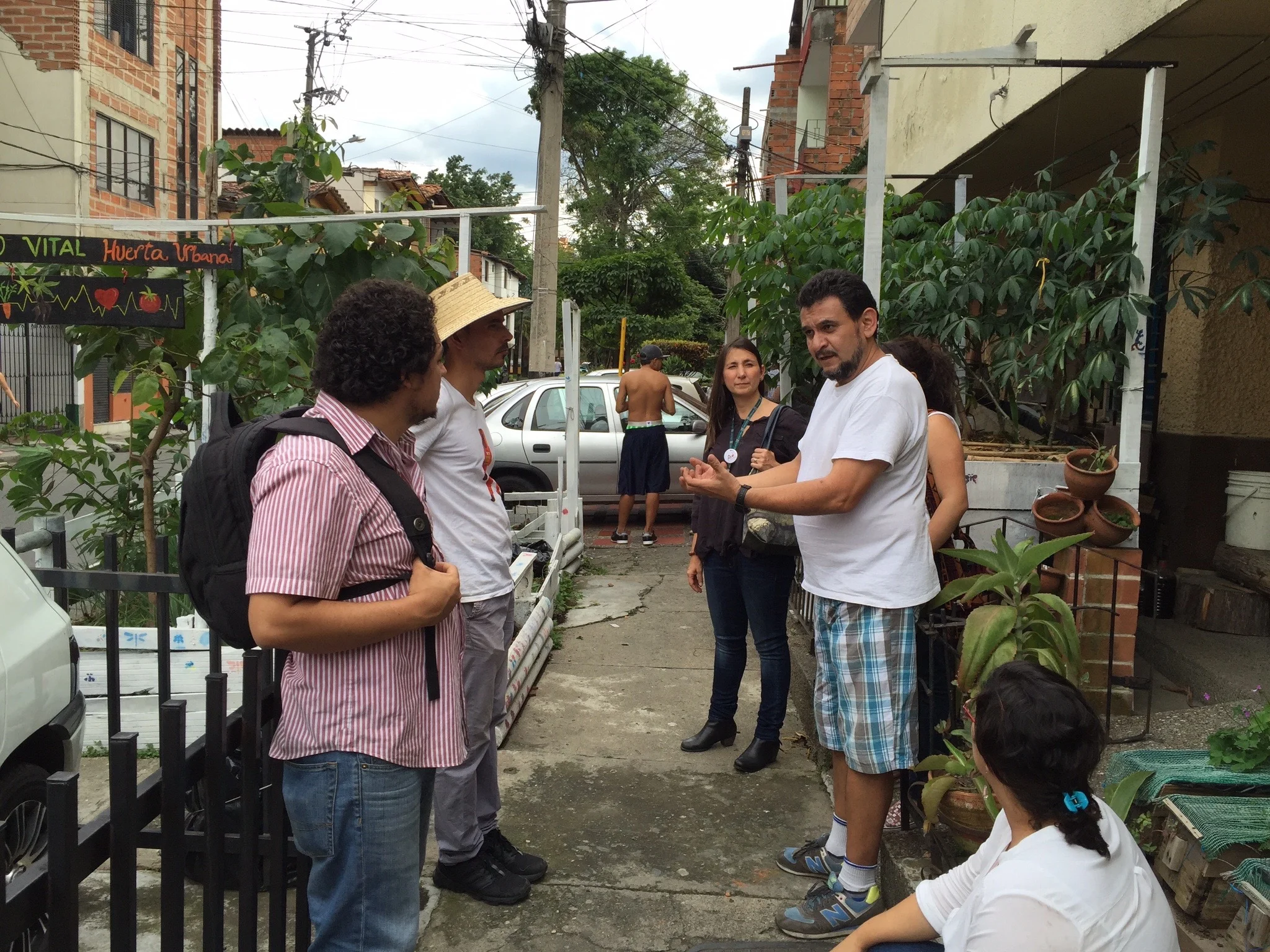 Javier Cardona showing visitors his garden, Espacio Vital